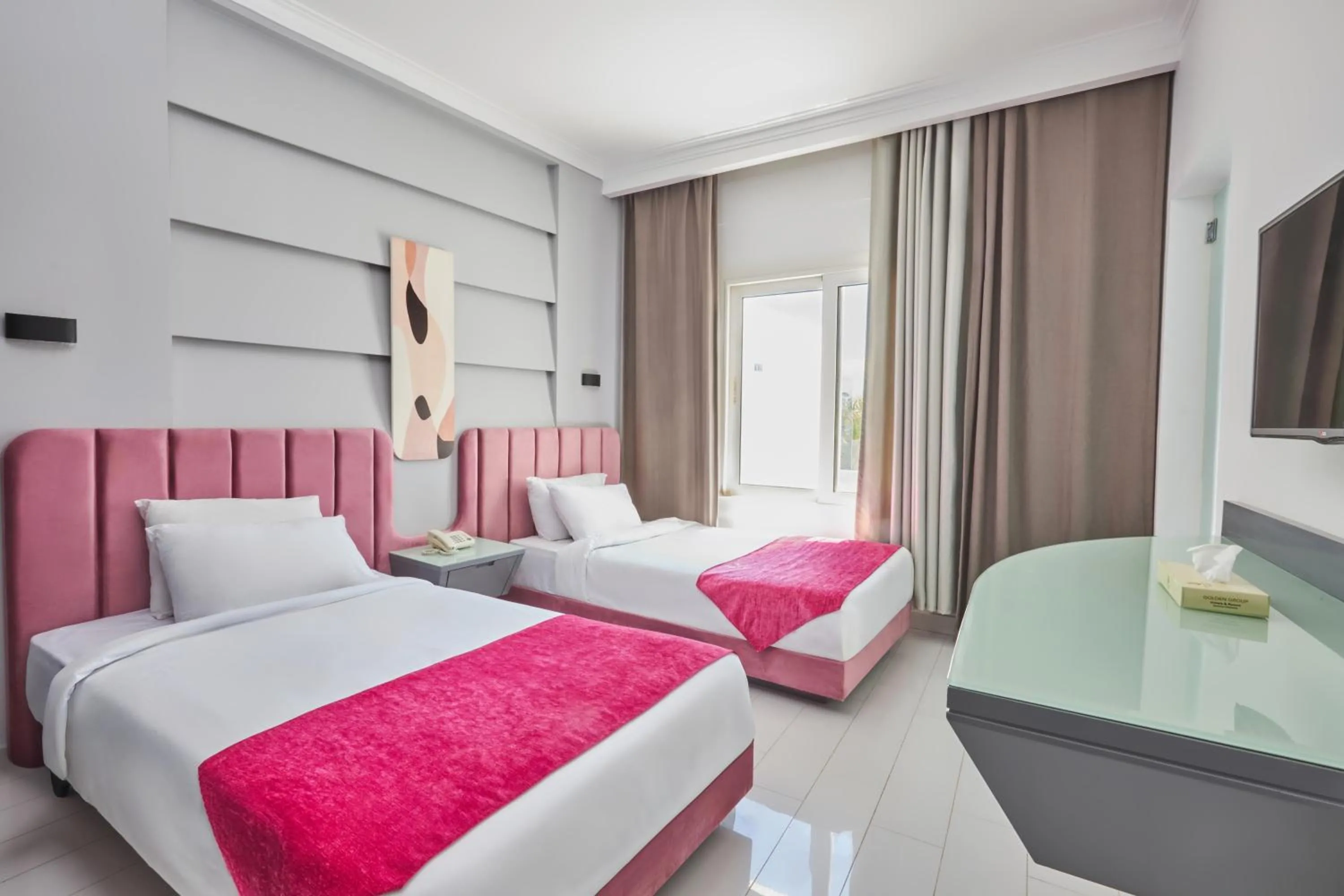 Bed in Golden Palace Marina Hotel