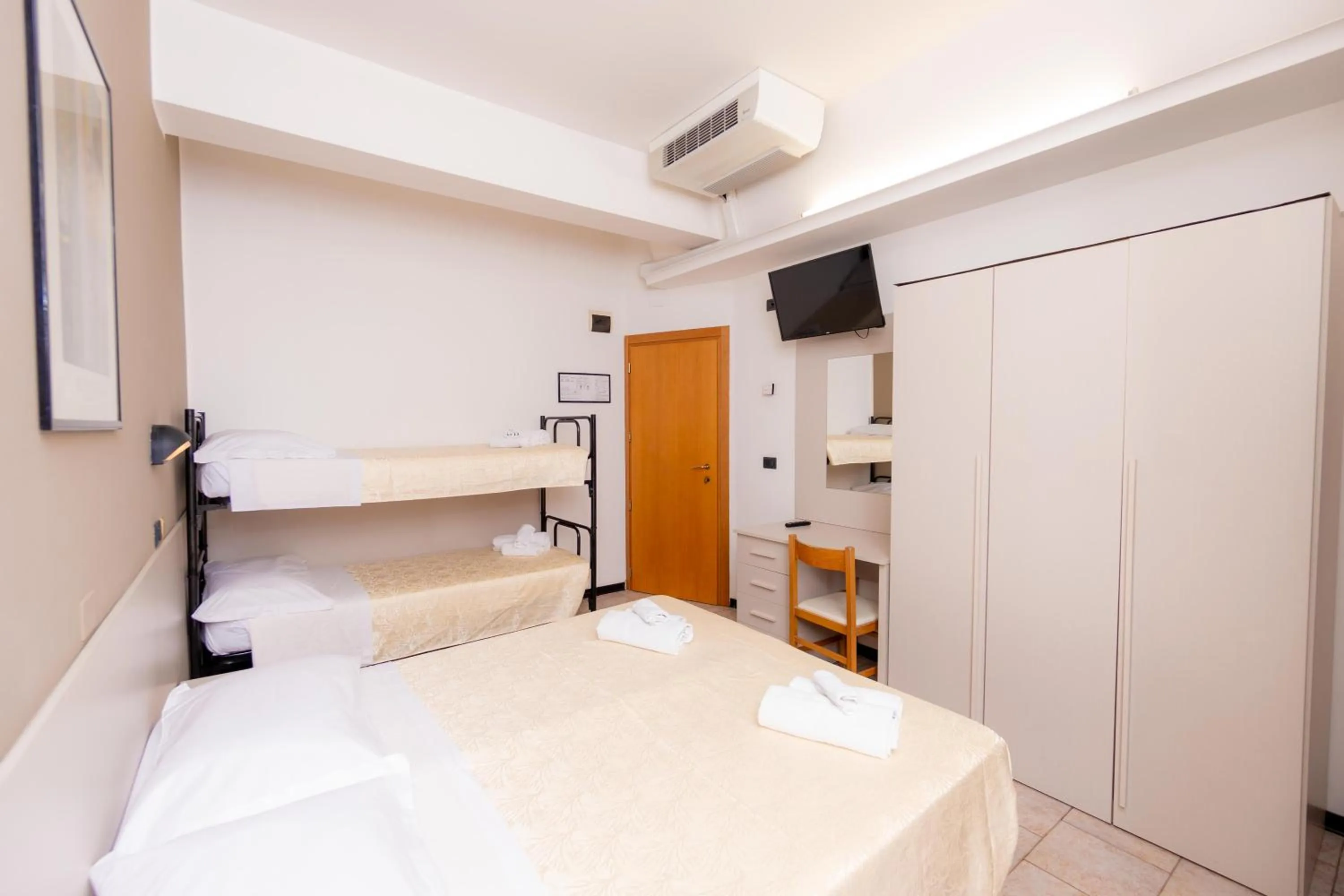 Bed in Hotel Galileo