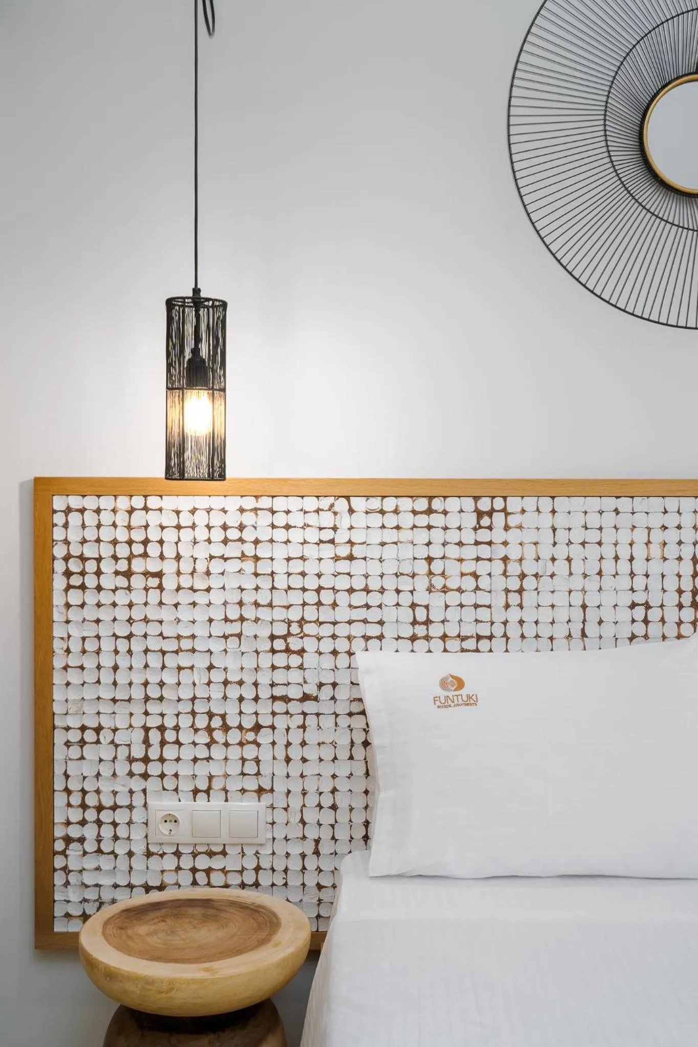 Bed in Funtuki Seaside Apartments