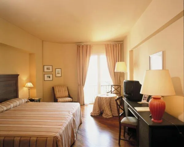 Bed in Grand Hotel Baia Verde