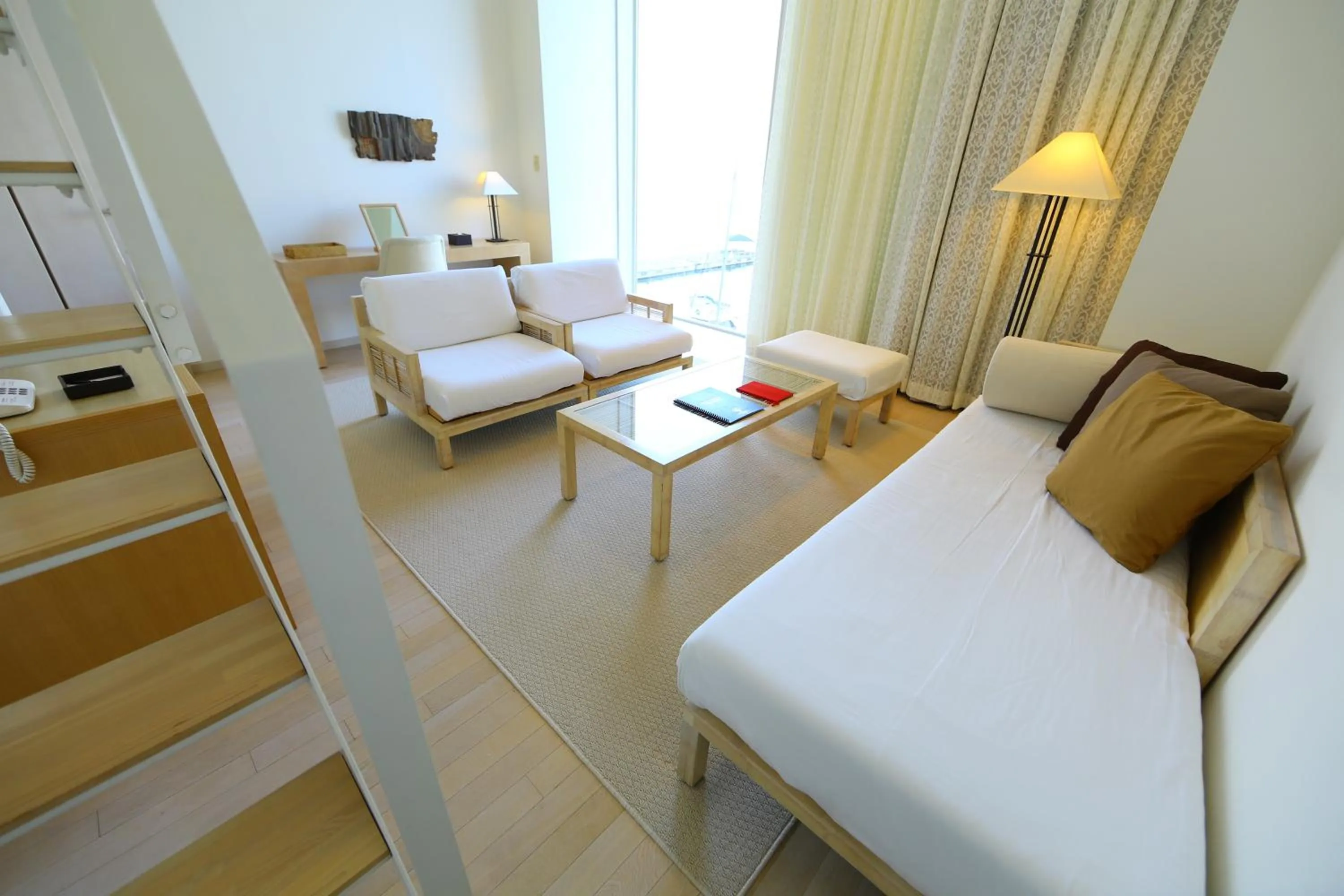 Photo of the whole room, Bed in Hotel Marinoa Resort Fukuoka