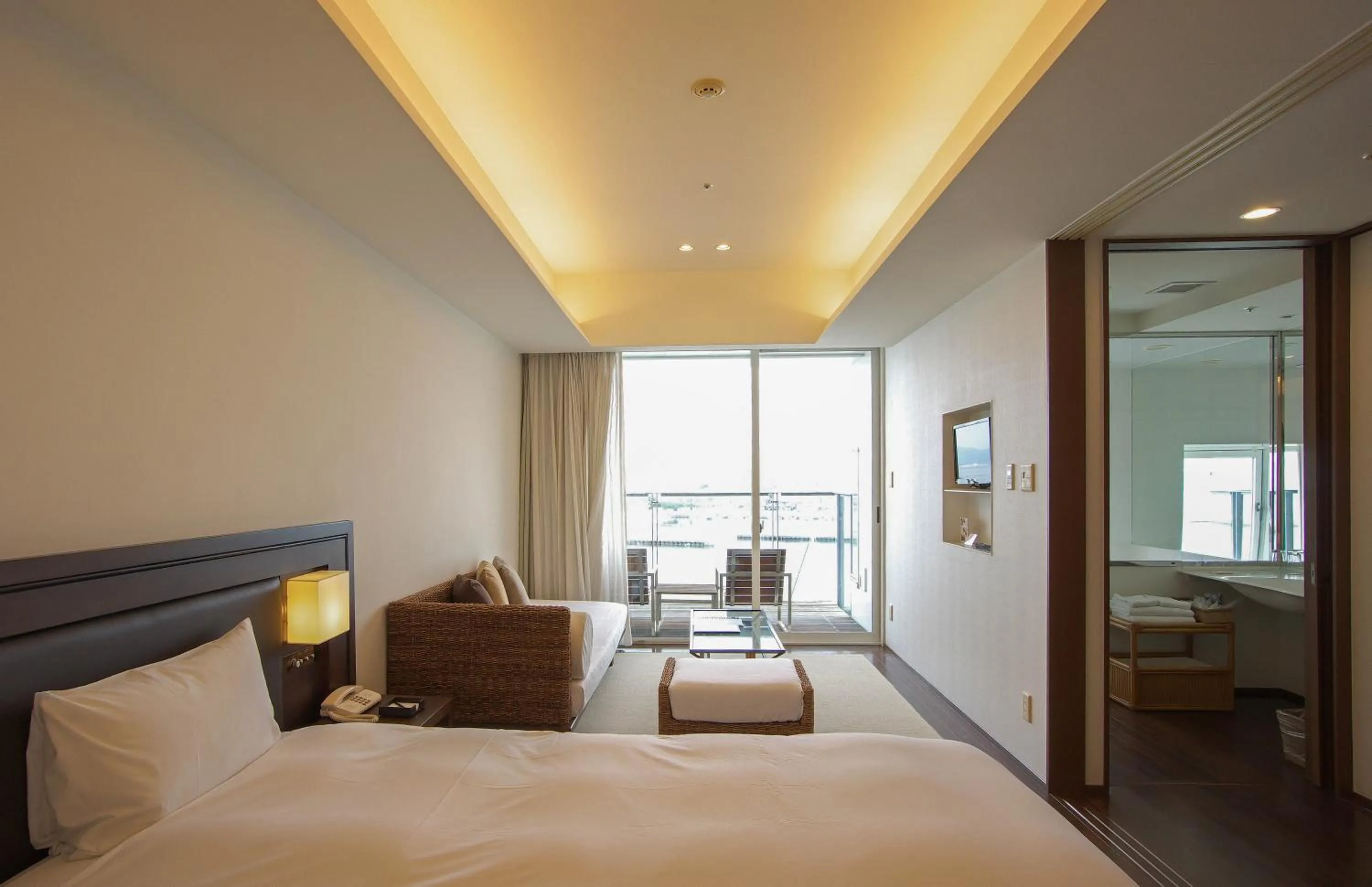 Photo of the whole room, Bed in Hotel Marinoa Resort Fukuoka