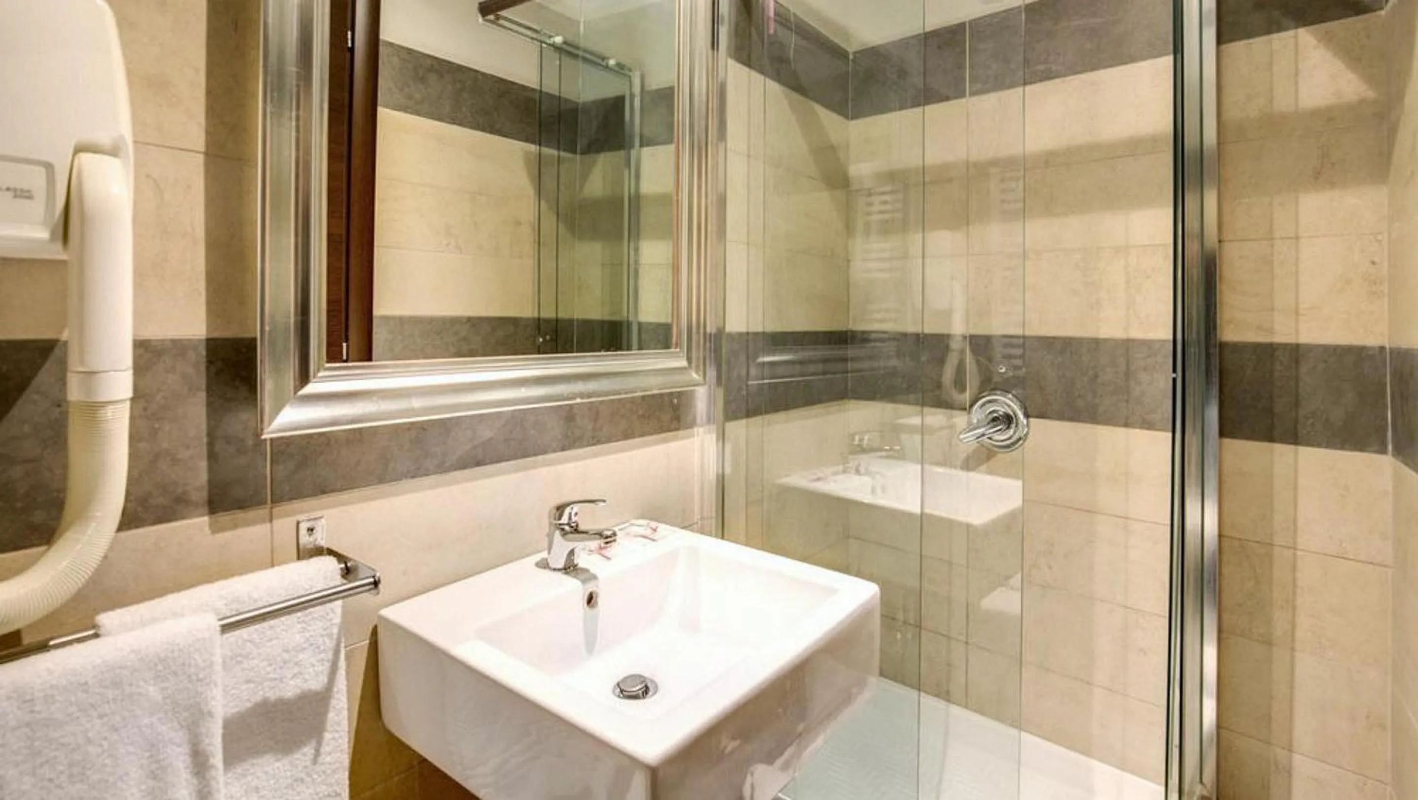 Bathroom in The Strand Hotel