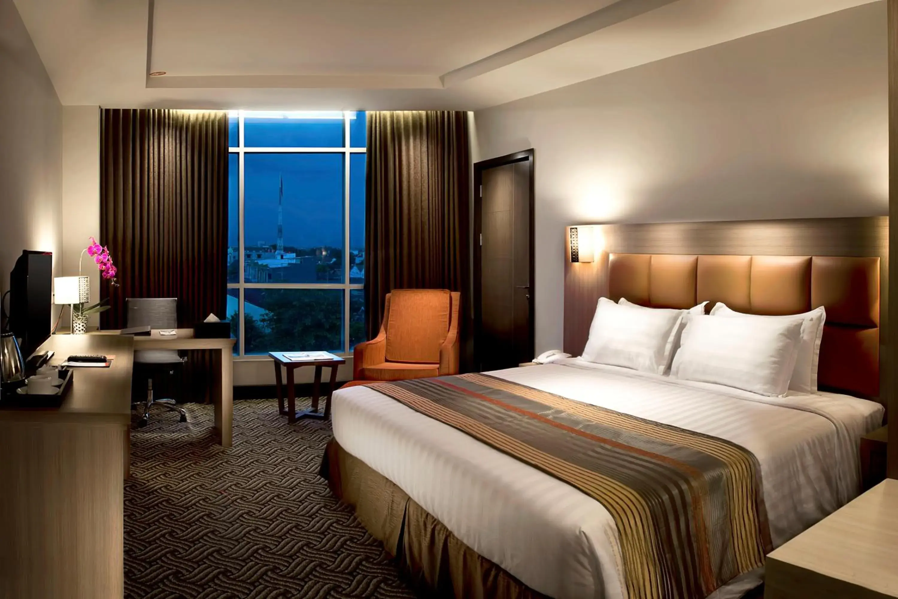 Bedroom, Bed in Cavinton Hotel Malioboro Yogyakarta Bedroom, Bed in Cavinton Hotel Malioboro Yogyakarta