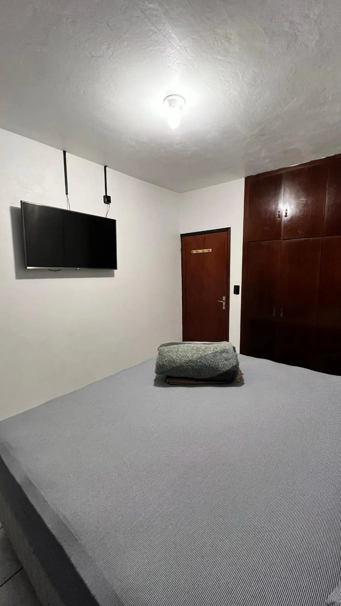 Bed in Pousada Central Jaraguá