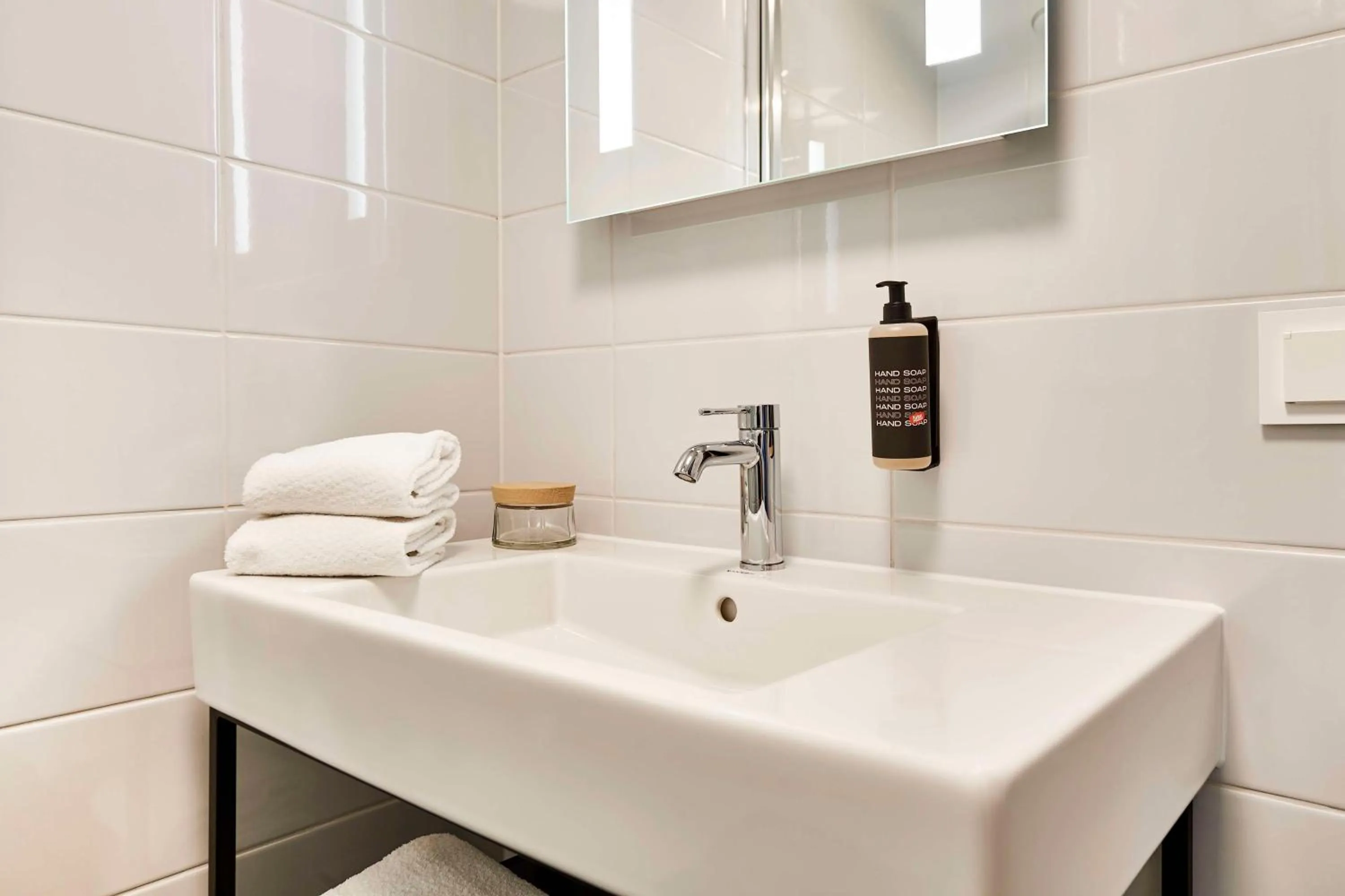 Bathroom in Aiden by Best Western Lolland