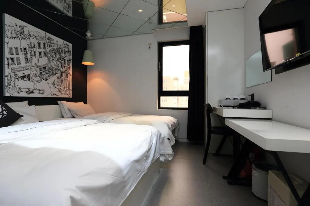 Bed in Jeju Cullinan Hotel