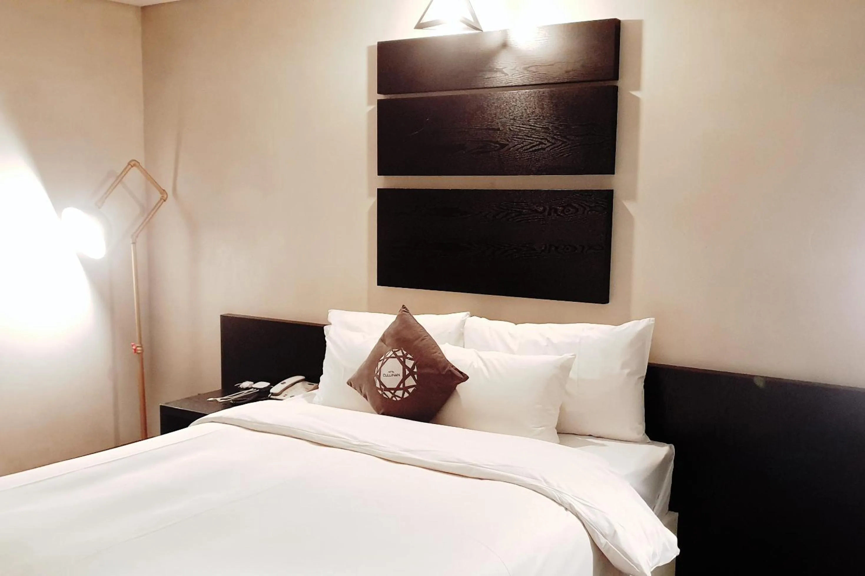 Bed in Jeju Cullinan Hotel