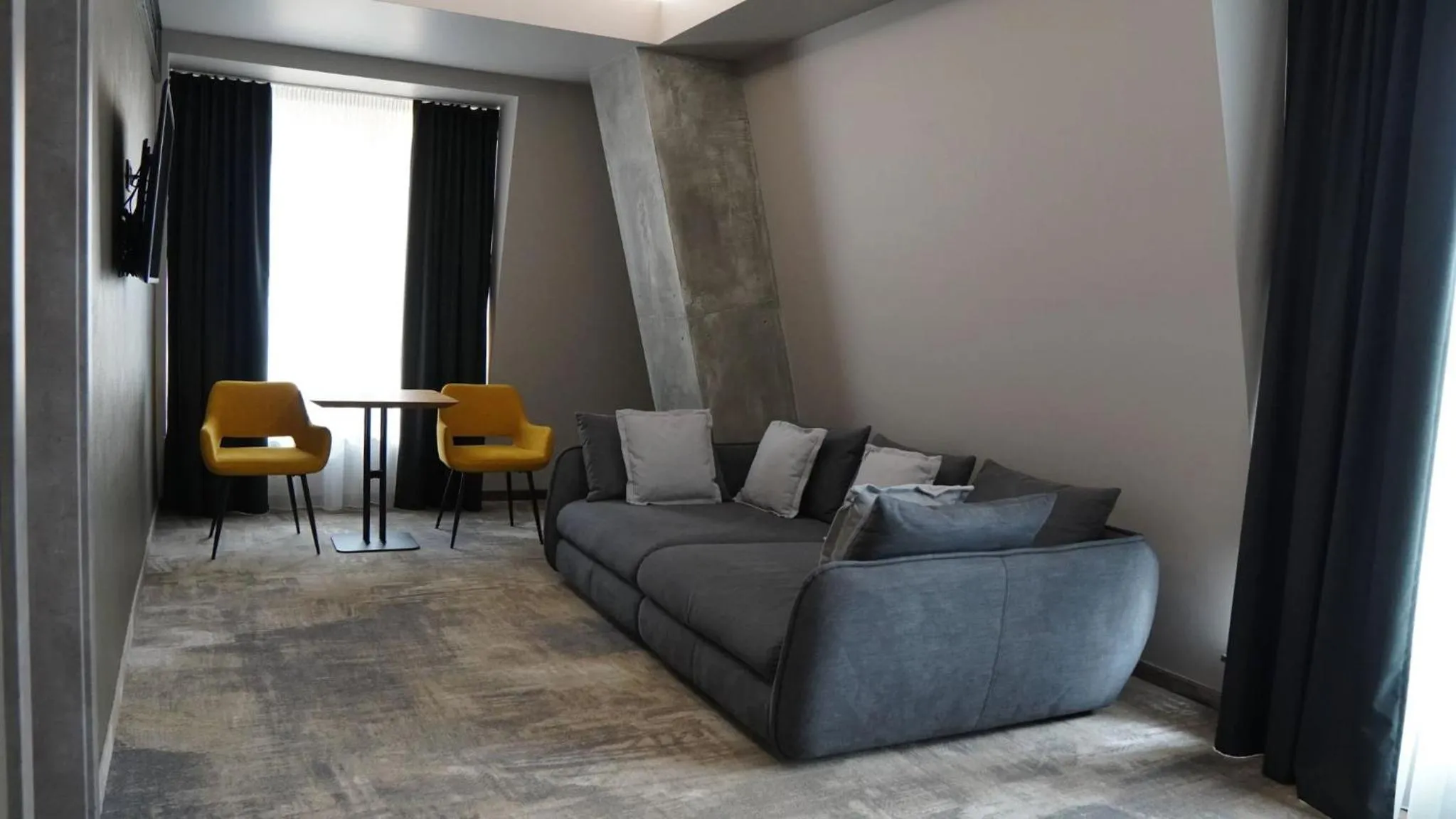 Living room in Aniroc Signature Hotel