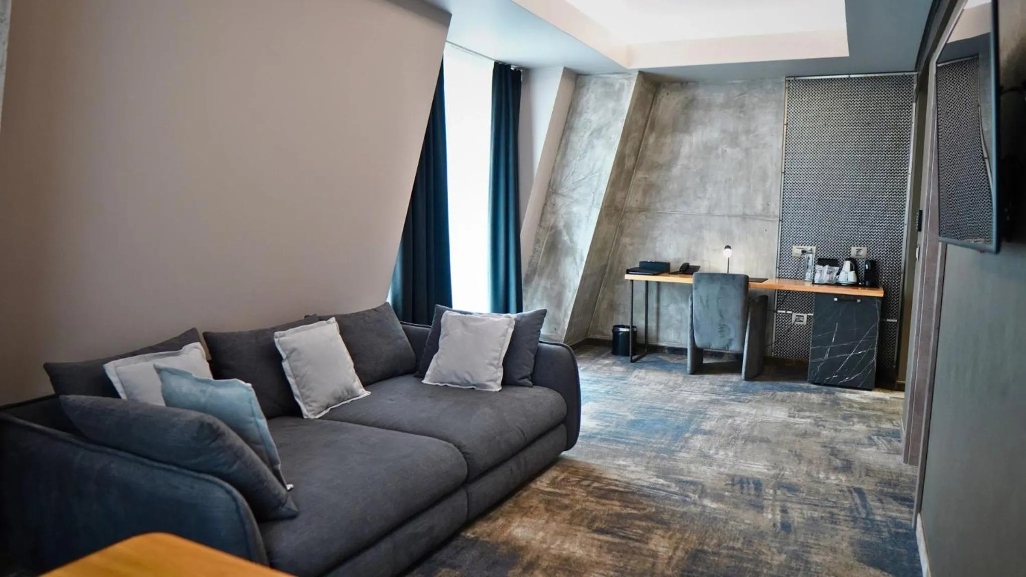 Living room in Aniroc Signature Hotel