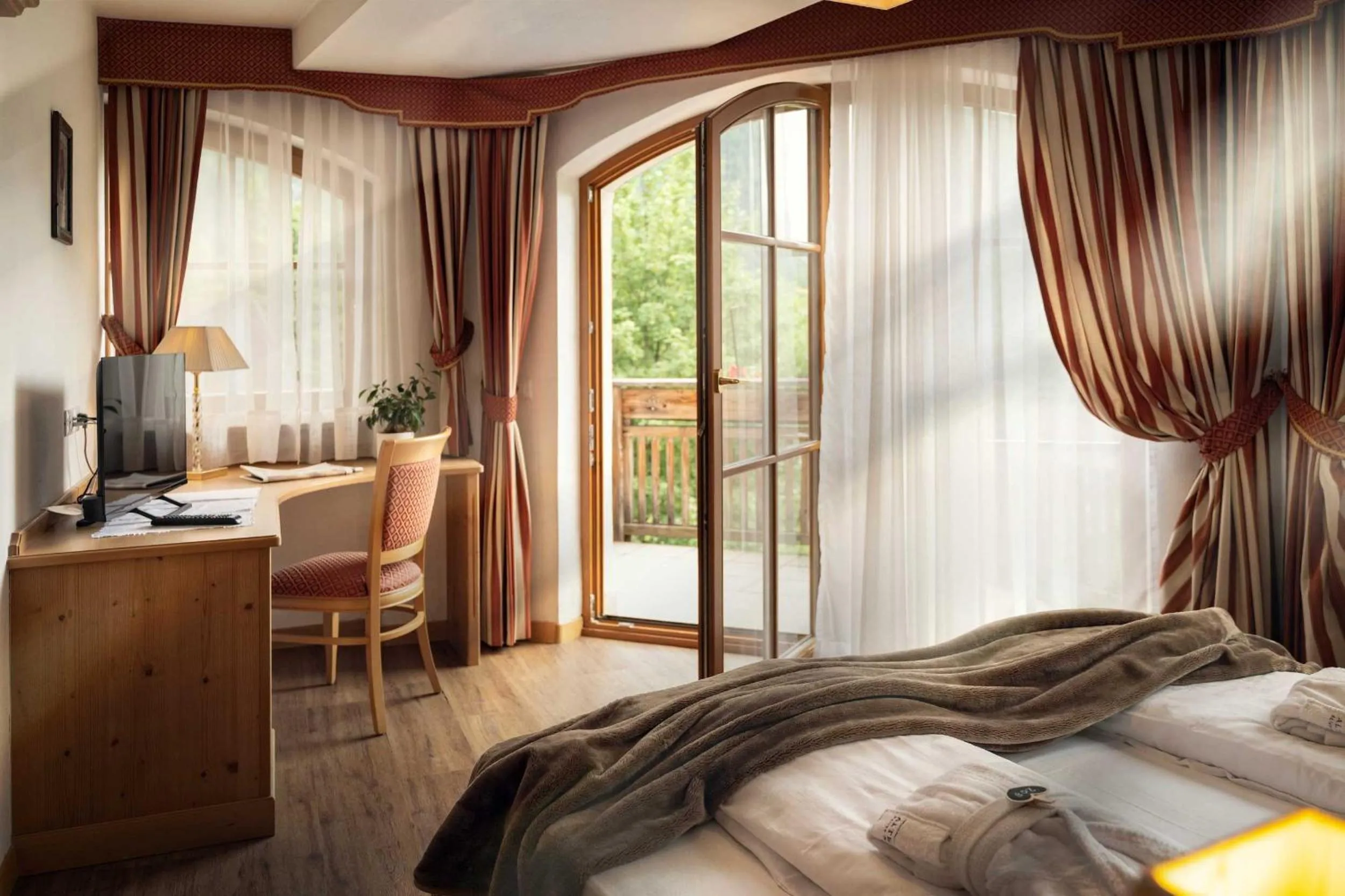 Bed in Hotel Alte Mühle 4 Stelle