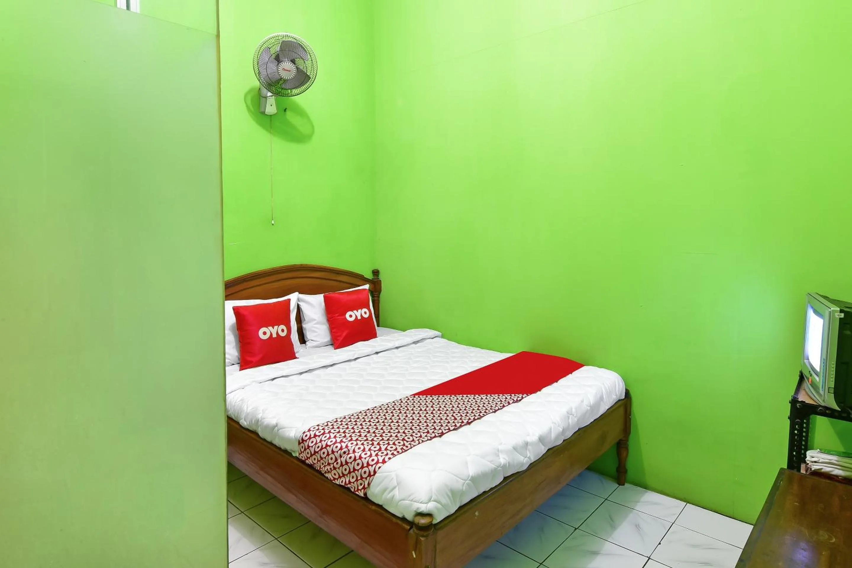 Bedroom, Bed in SPOT ON 91357 Hotel Mulyo