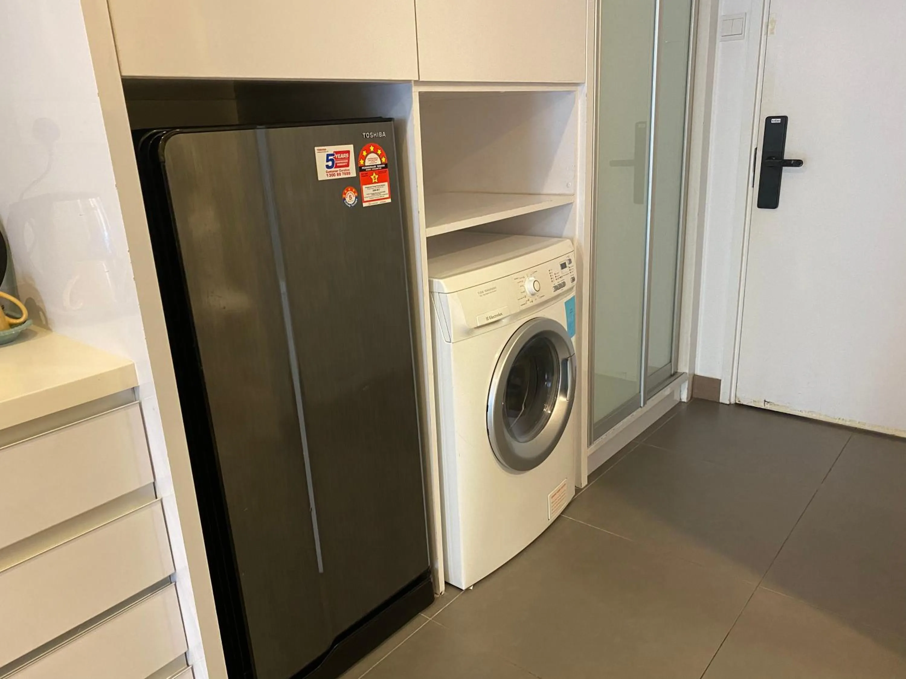 washing machine in Lila Suites One Bukit Ceylon