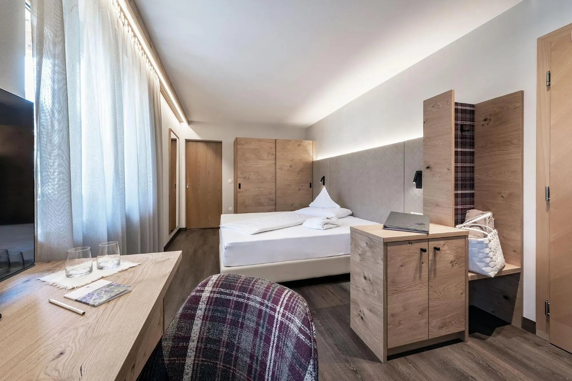 Bed in Baumgartner's Blumenhotel