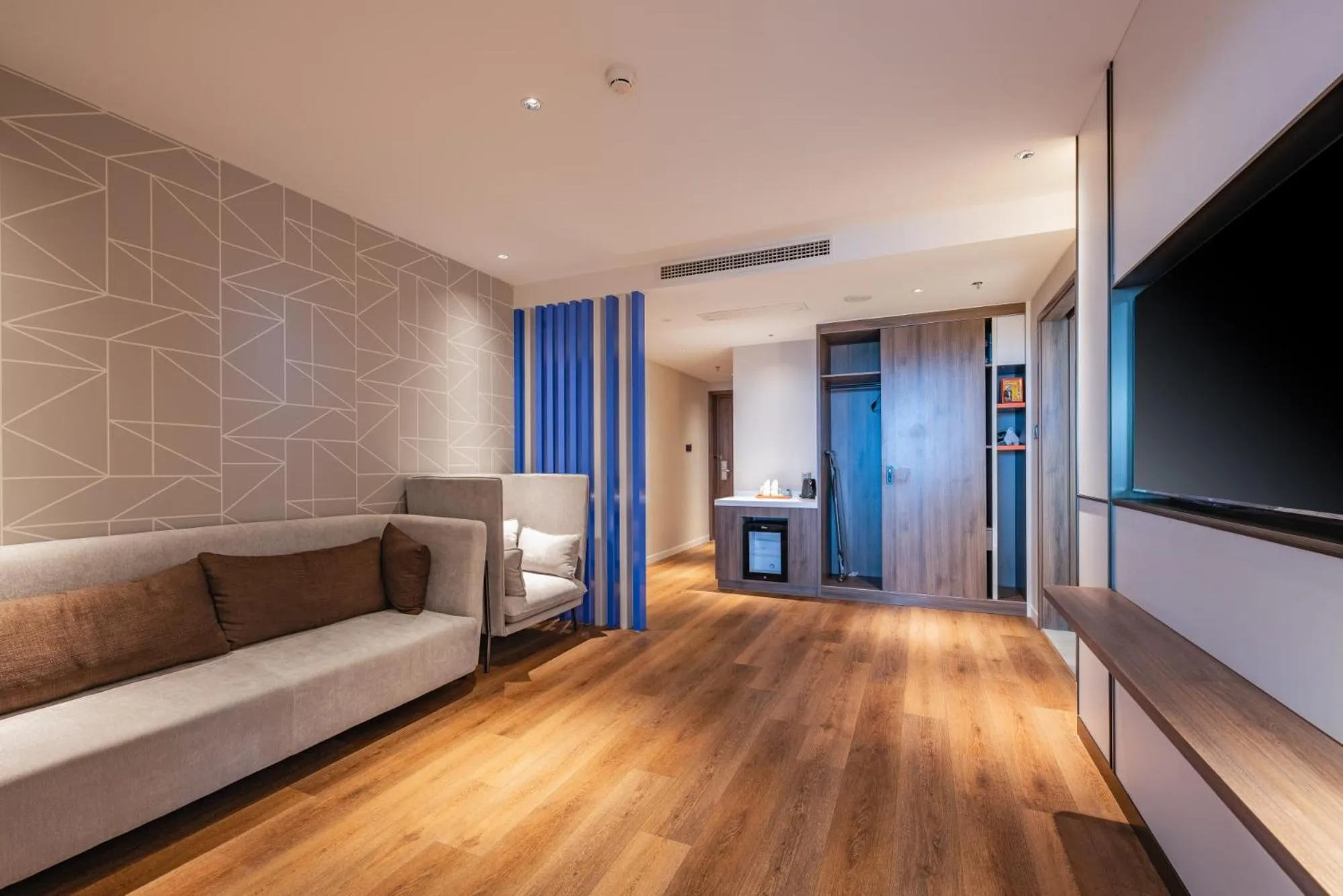 Living room in Holiday Inn Express Huludao Seaview by IHG