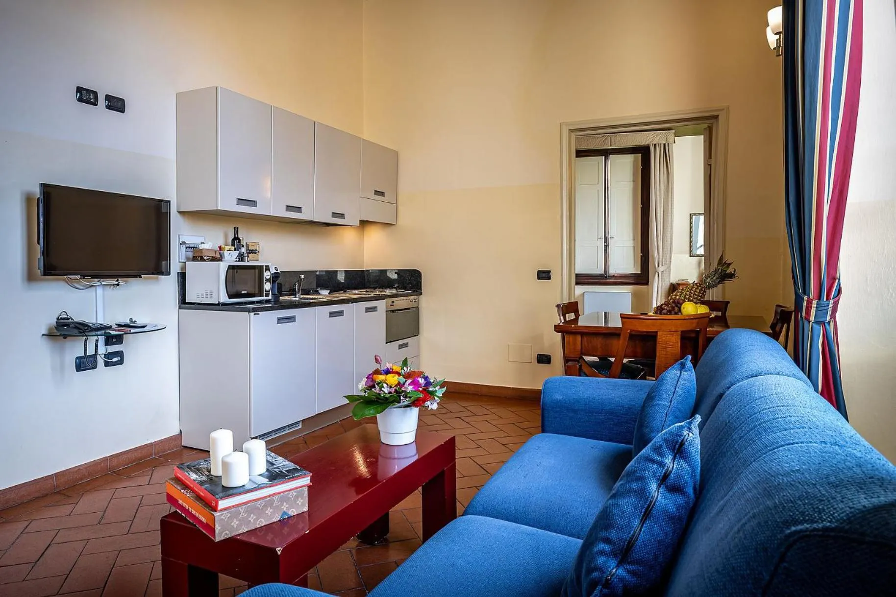 Kitchen or kitchenette in Palazzo Gamba Apartments al Duomo
