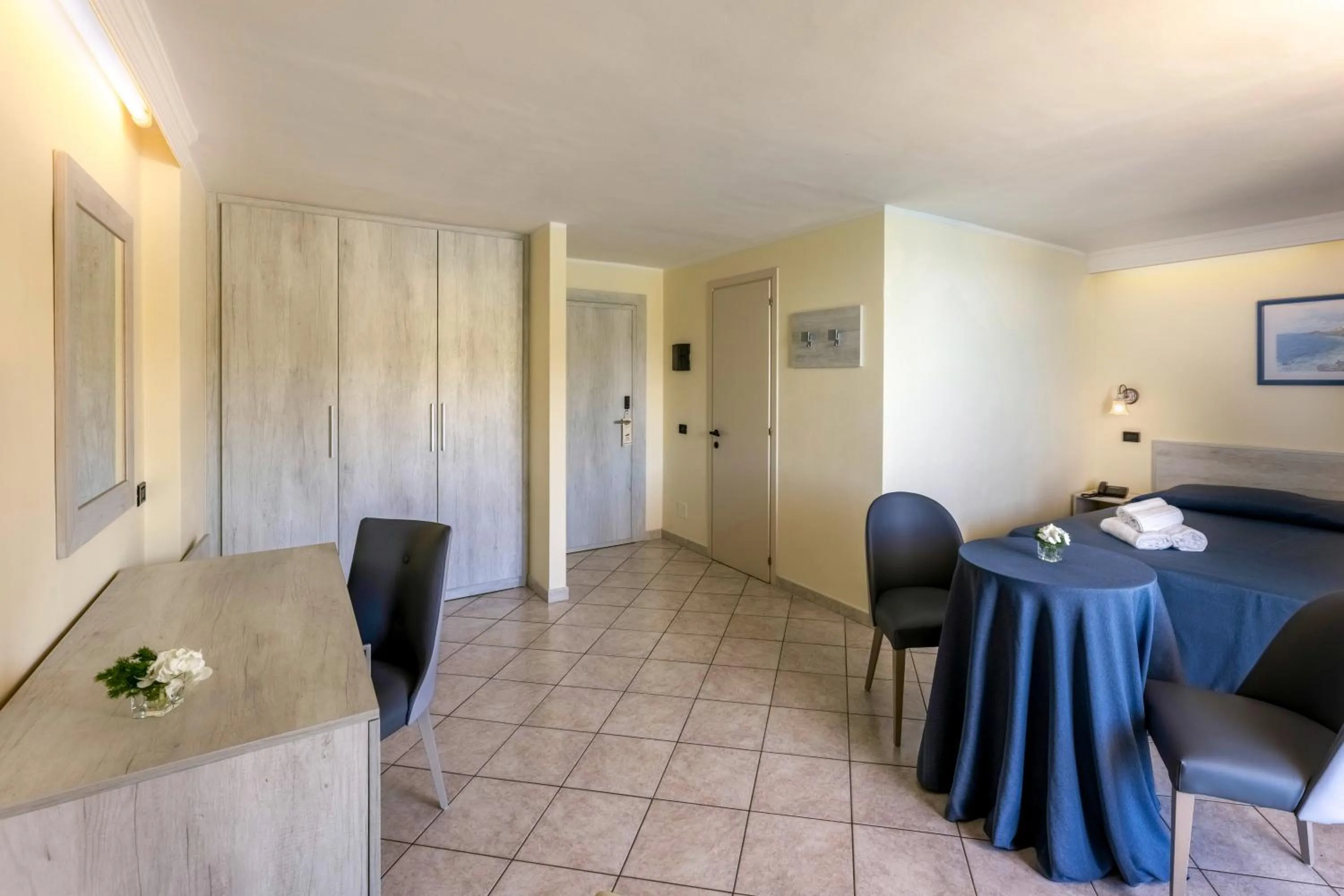 Bedroom in Pugnochiuso Resort Hotel del Faro