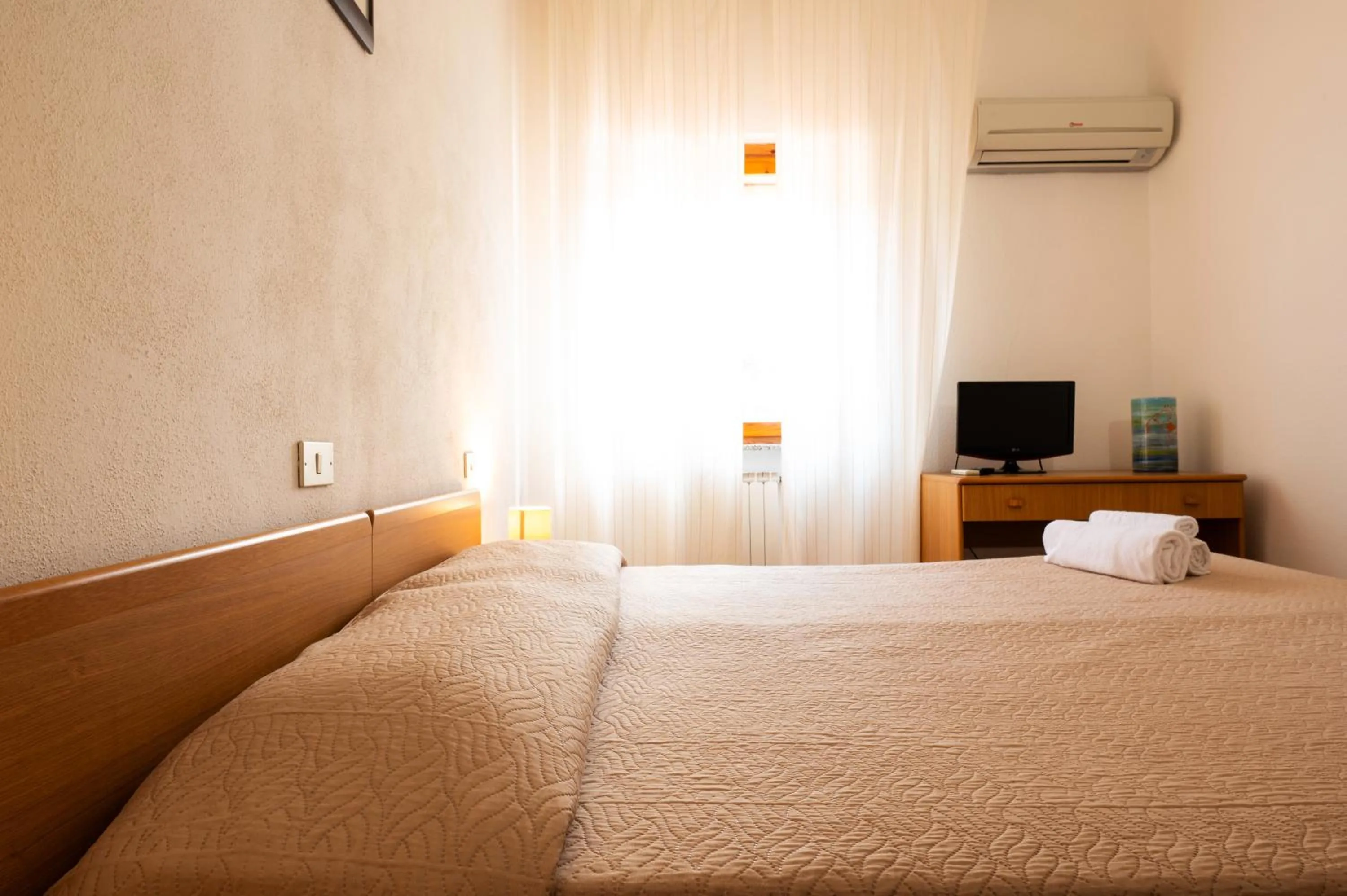 Bed in Hotel L'Aragosta