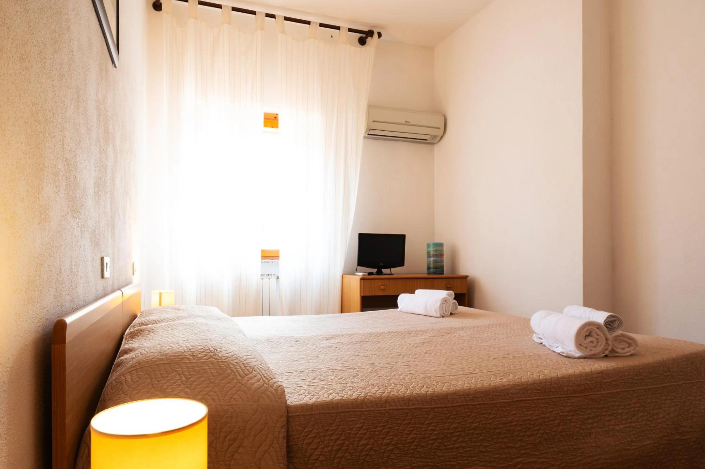 Bed in Hotel L'Aragosta