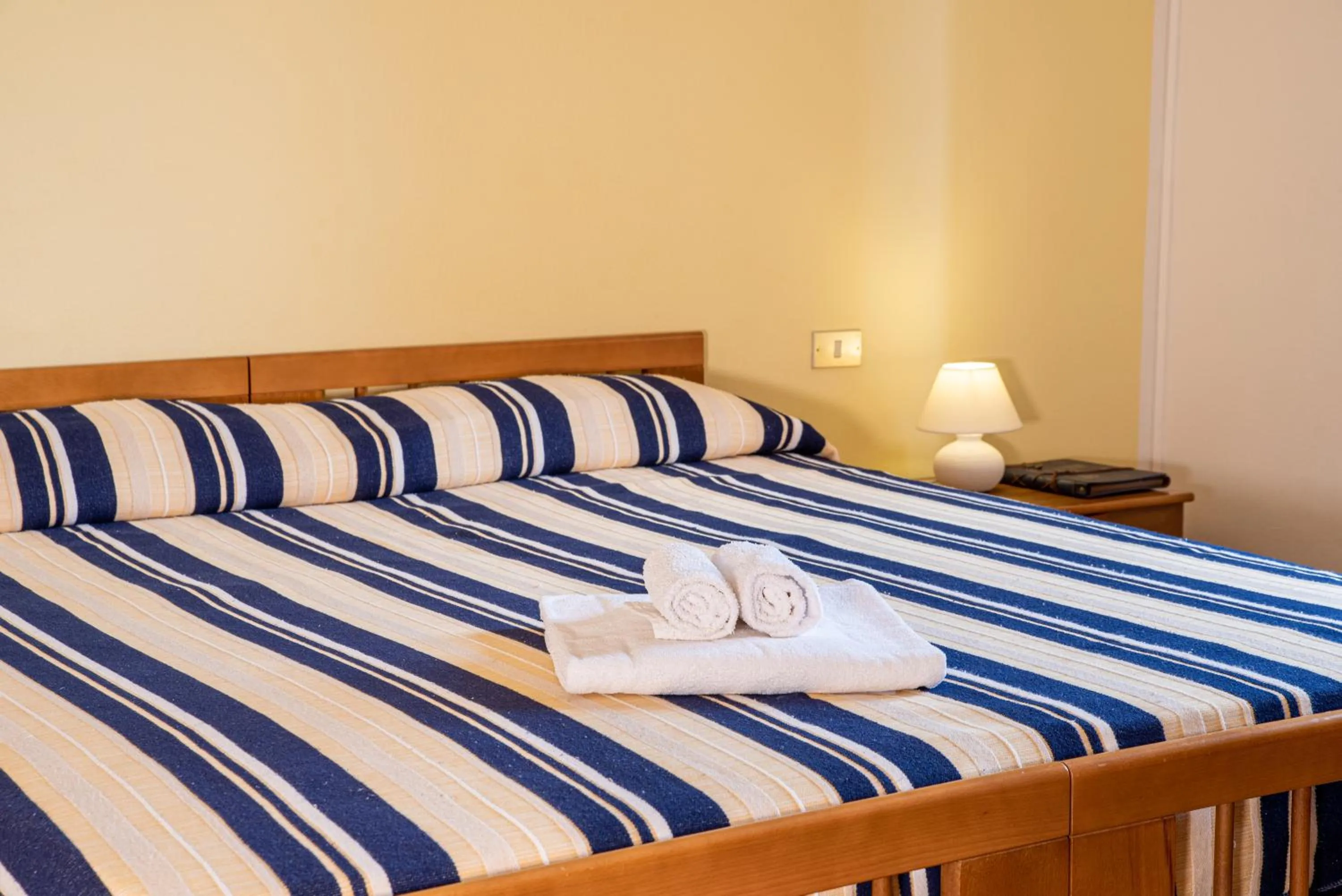 Bed in Hotel L'Aragosta