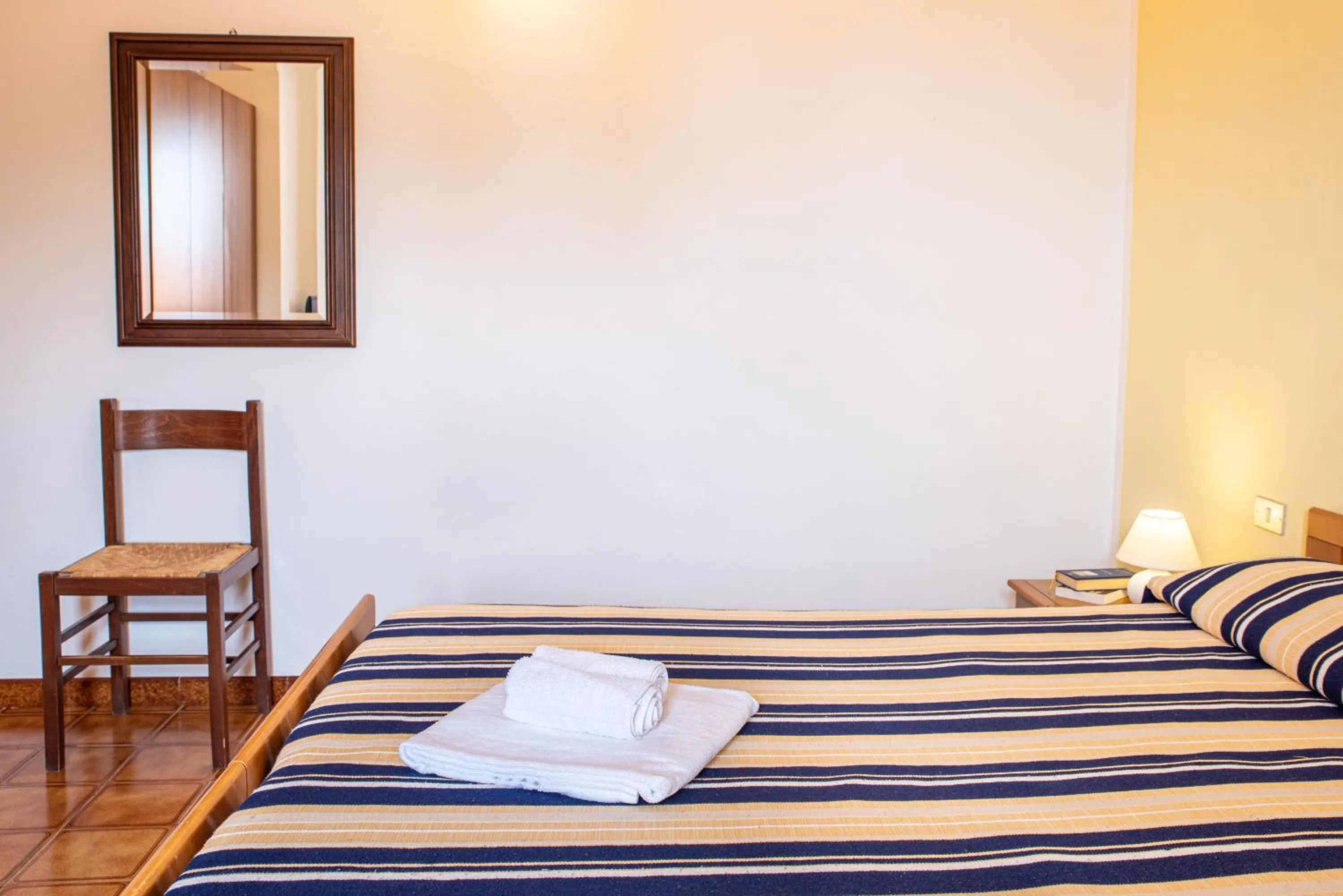 Bed in Hotel L'Aragosta