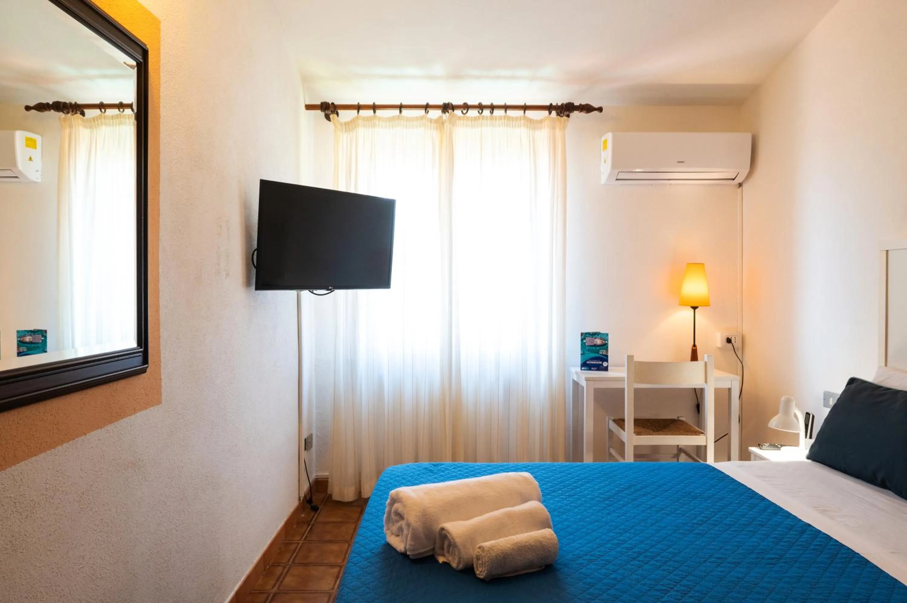 Bed in Hotel L'Aragosta