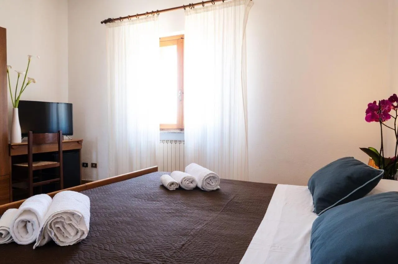 Bed in Hotel L'Aragosta