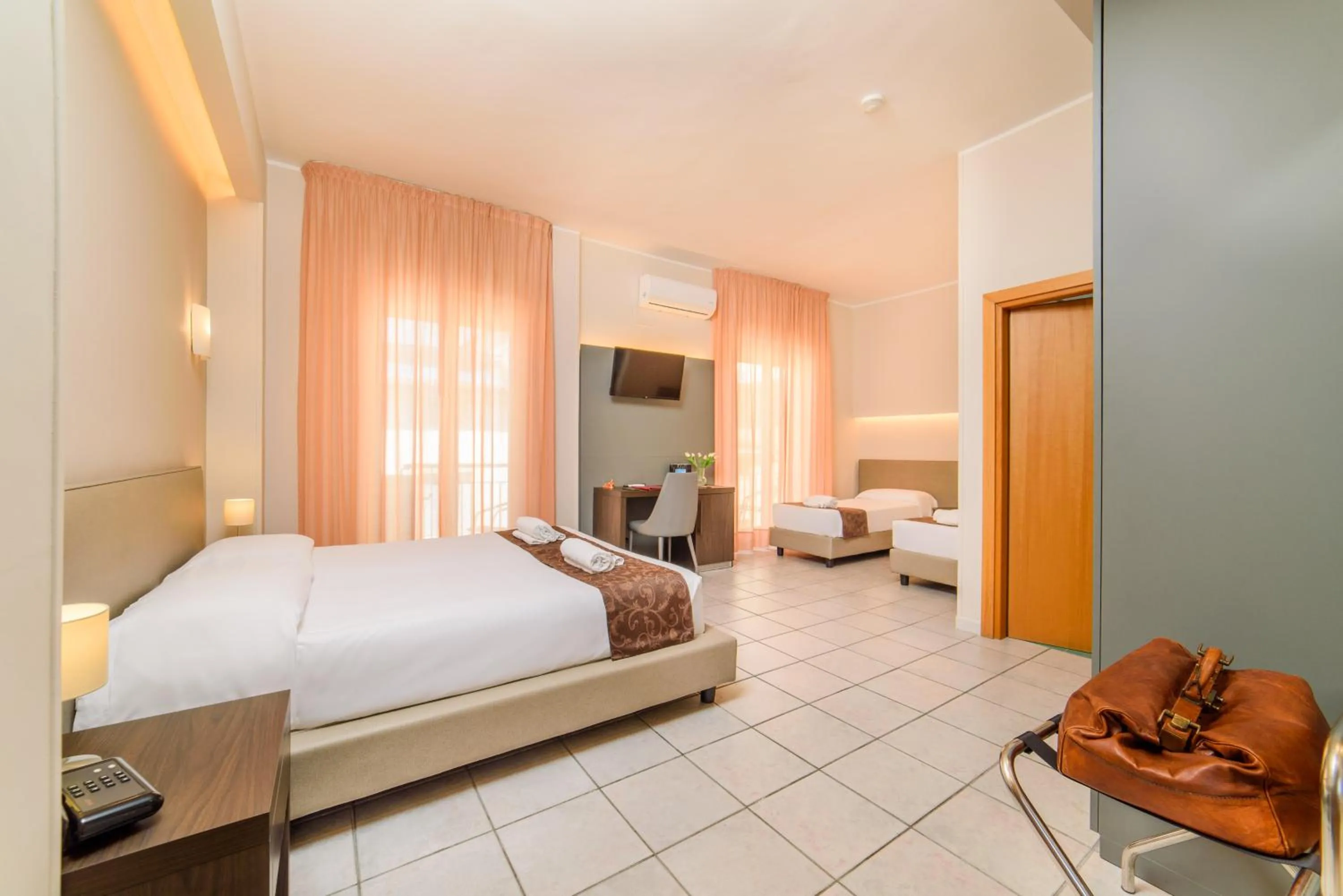 Bed in Hotel Tirreno