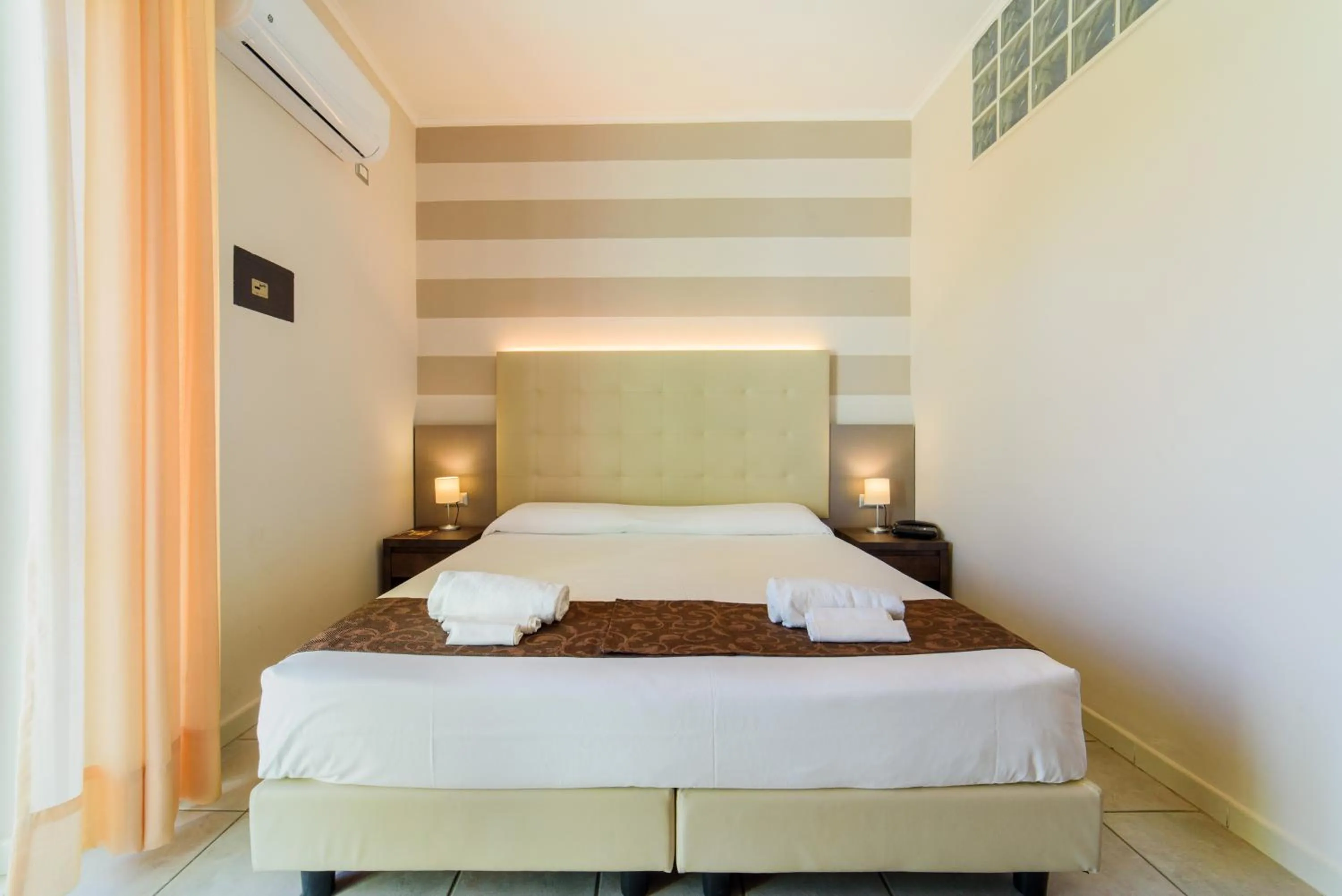 Bed in Hotel Tirreno