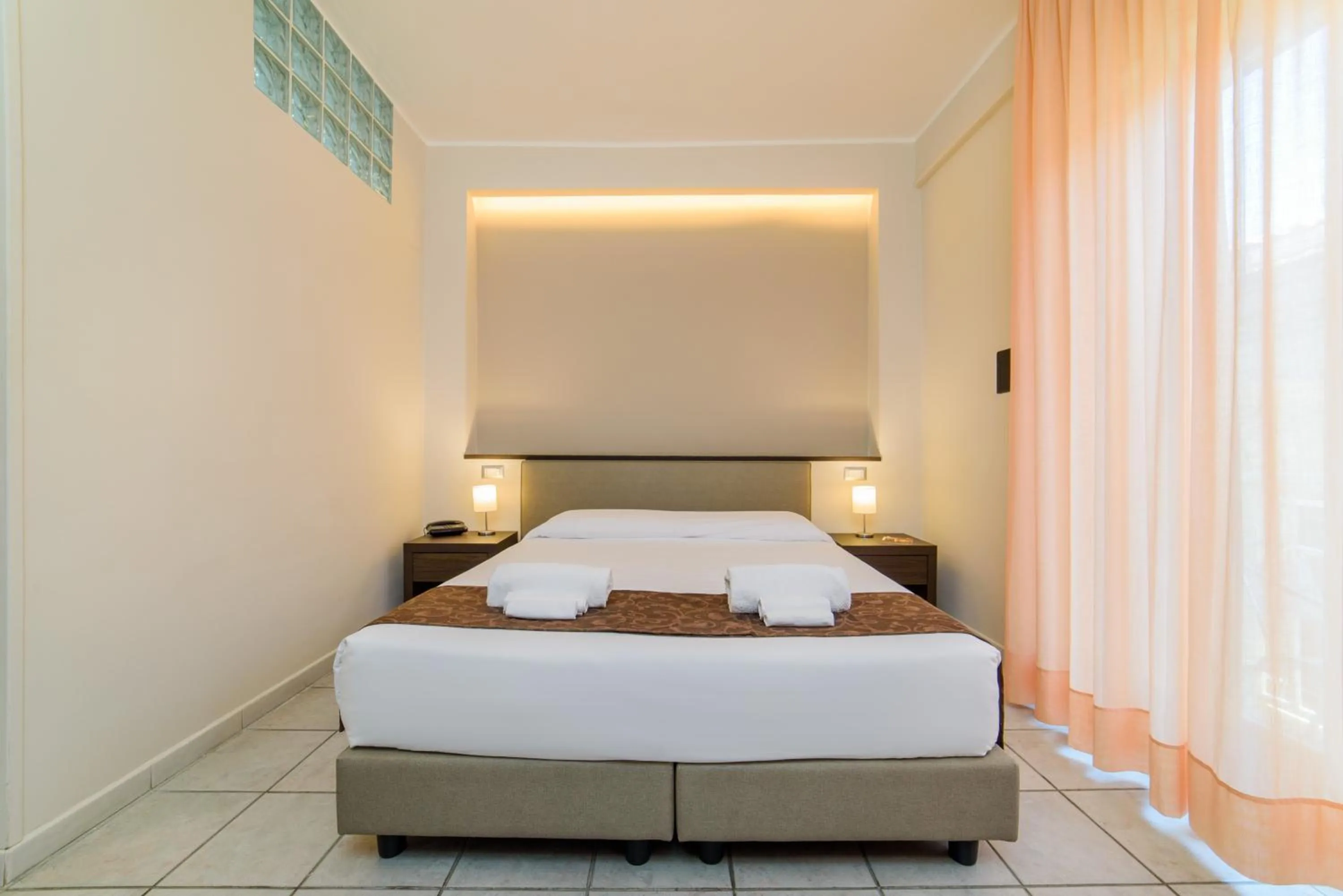 Bed in Hotel Tirreno