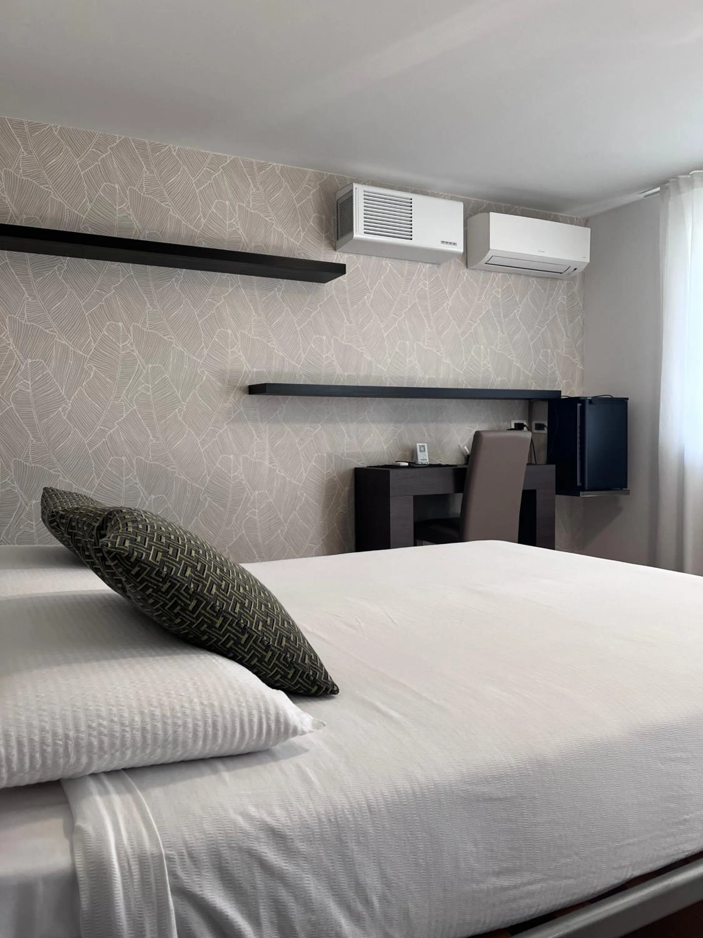 Bed in Hotel Isola Verde