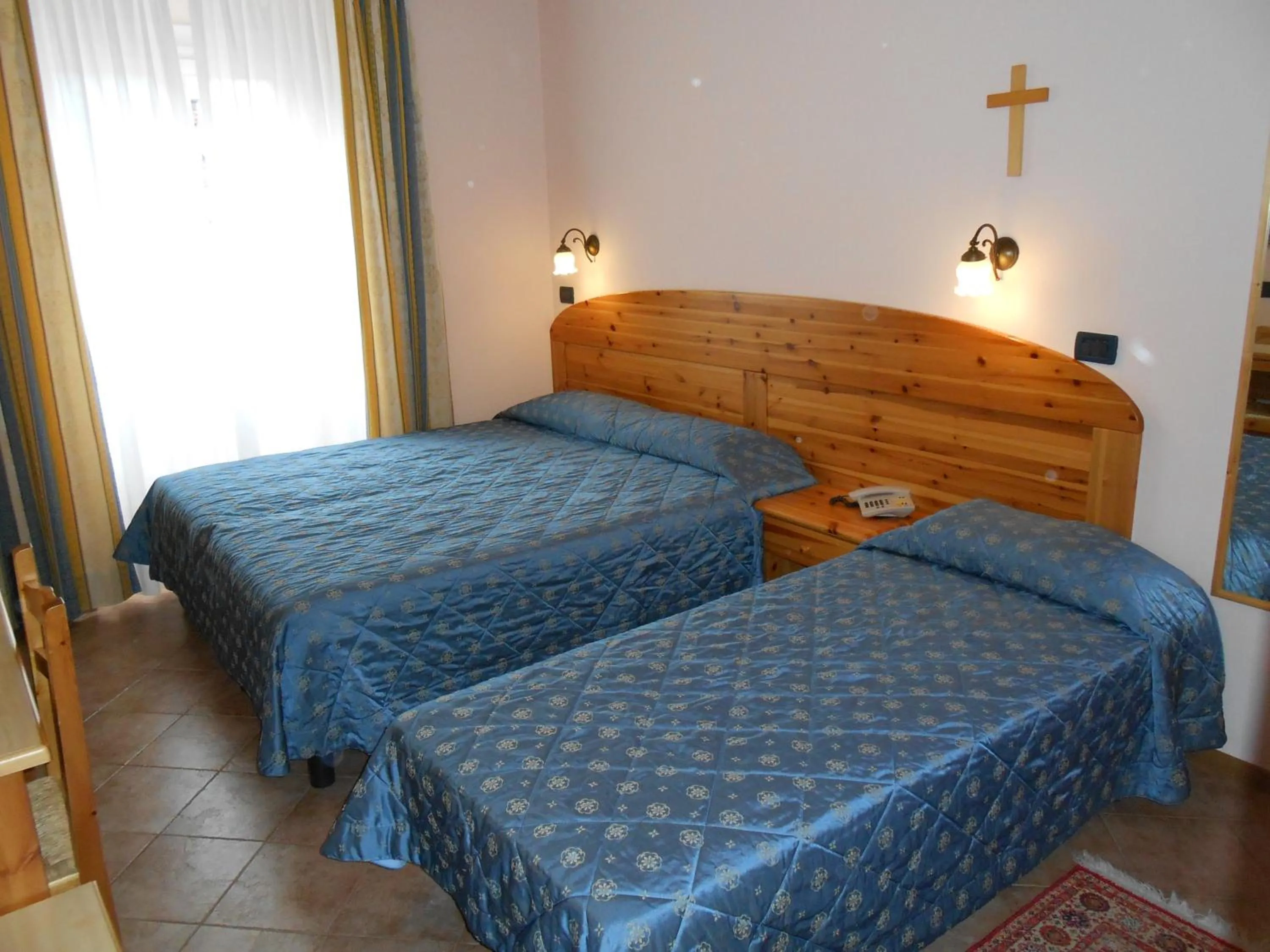 Bed in Hotel Vittoria