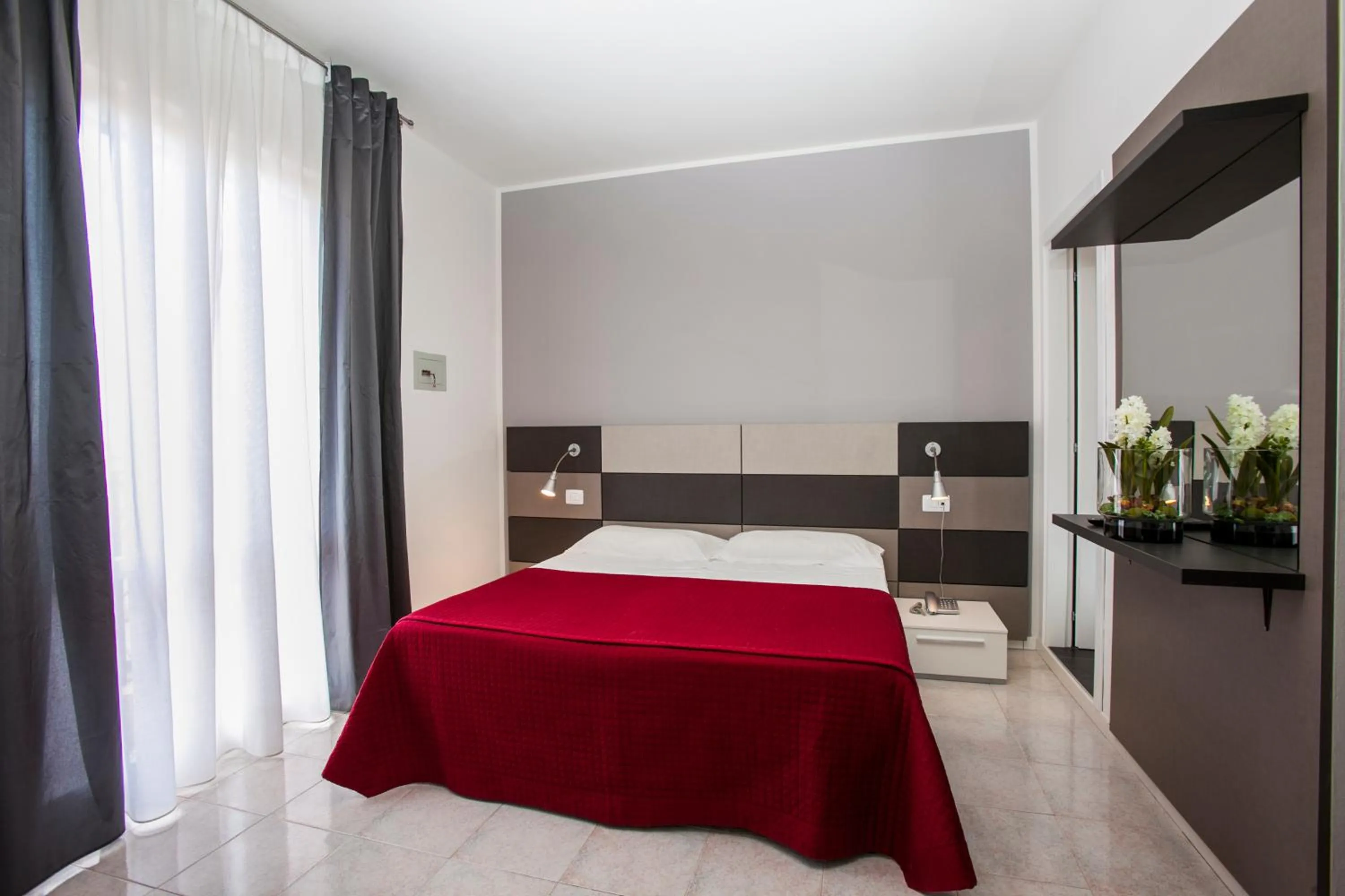 Bed in Hotel Gardenia