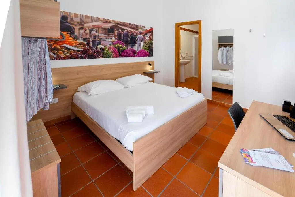 Bed in Ballaro' Hotel - Budget Room