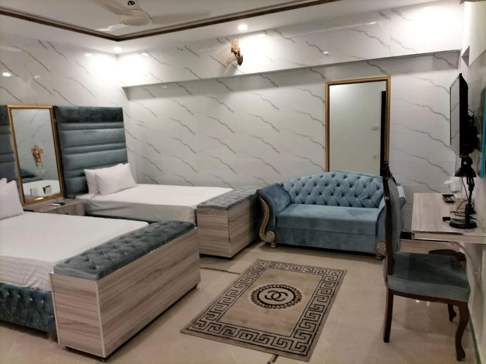 Bed in Grand Swiss Hotel&Apartment Lahore