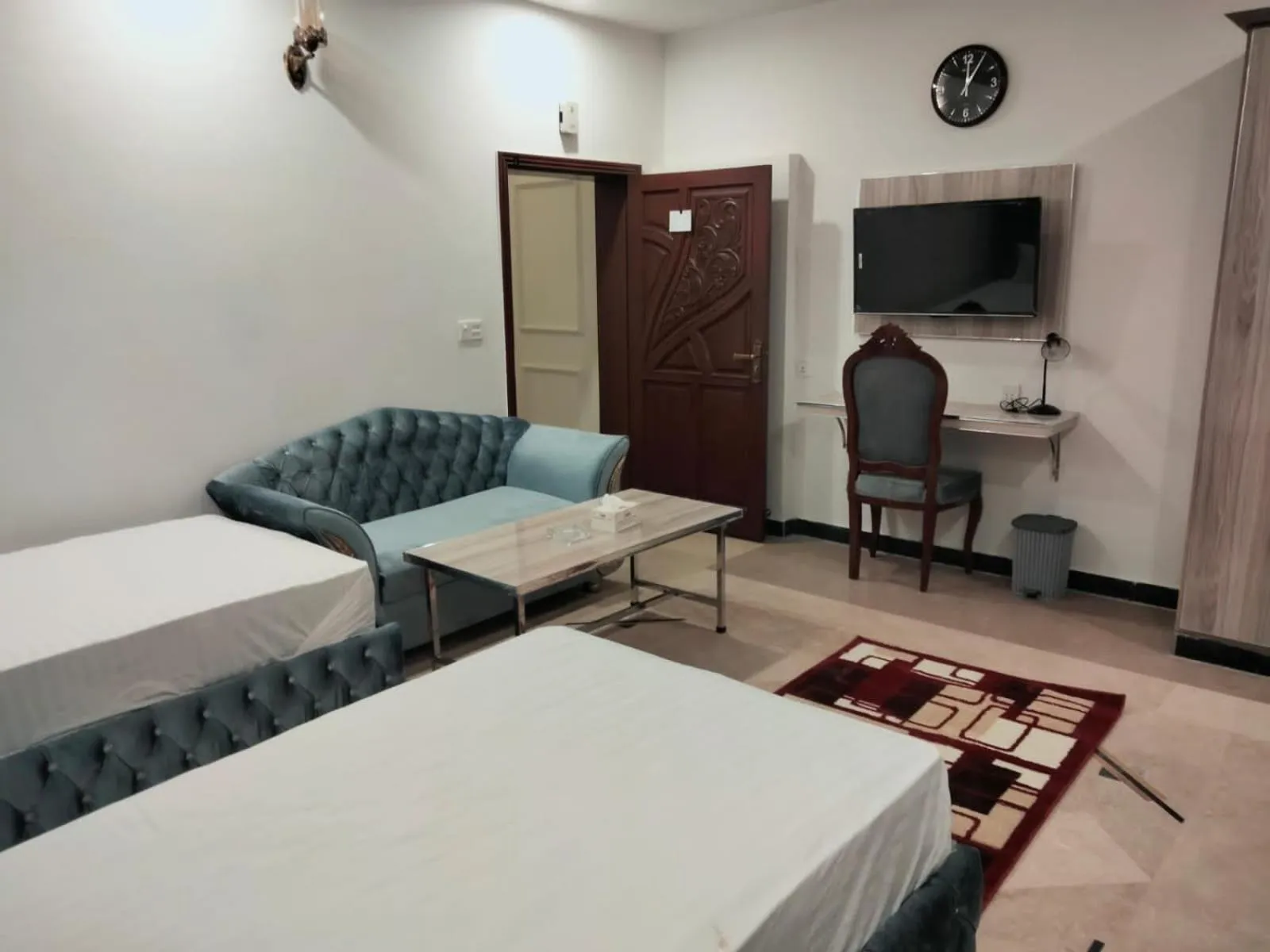 Photo of the whole room, Bed in Grand Swiss Hotel&Apartment Lahore