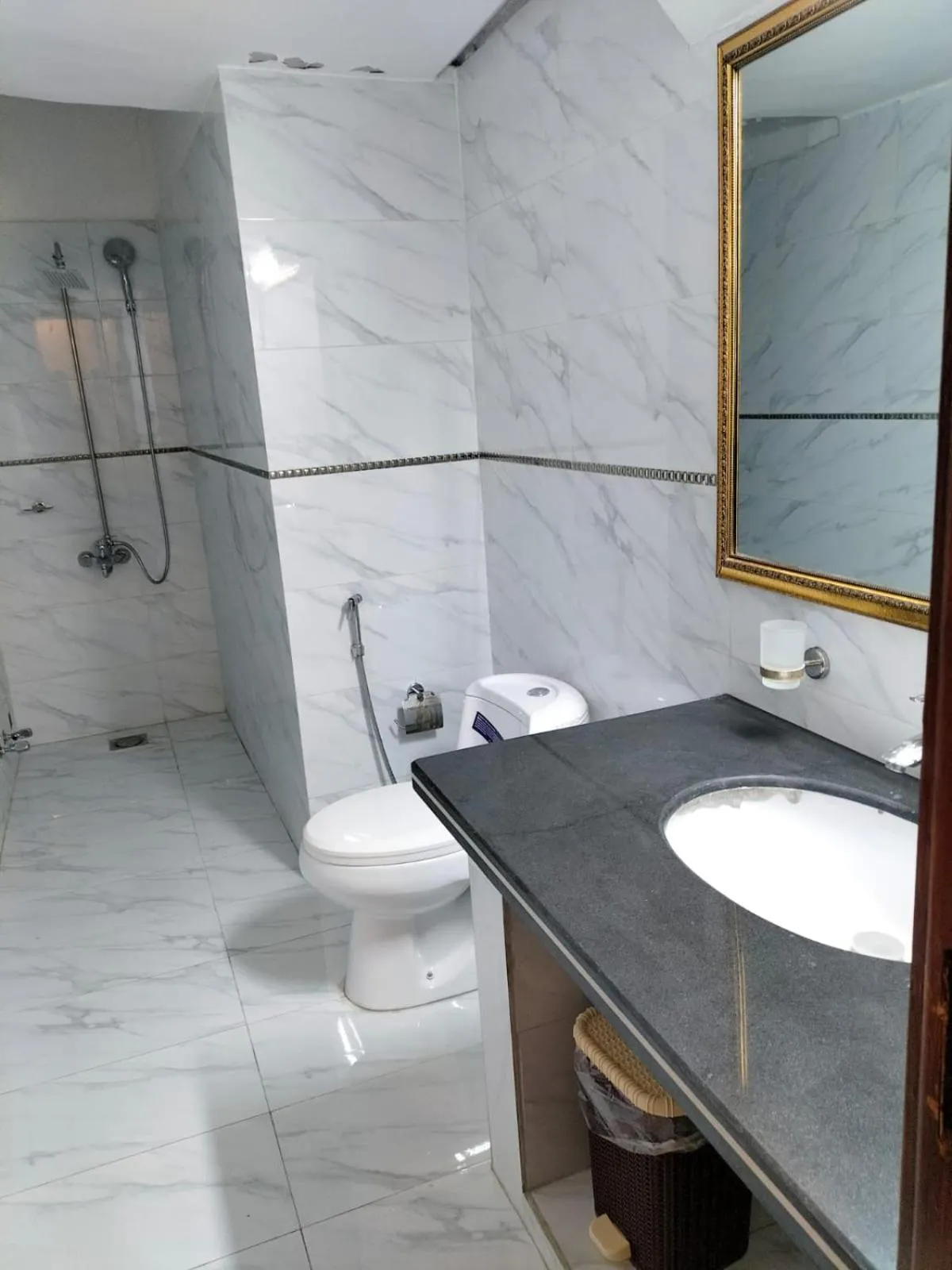 Shower in Grand Swiss Hotel&Apartment Lahore