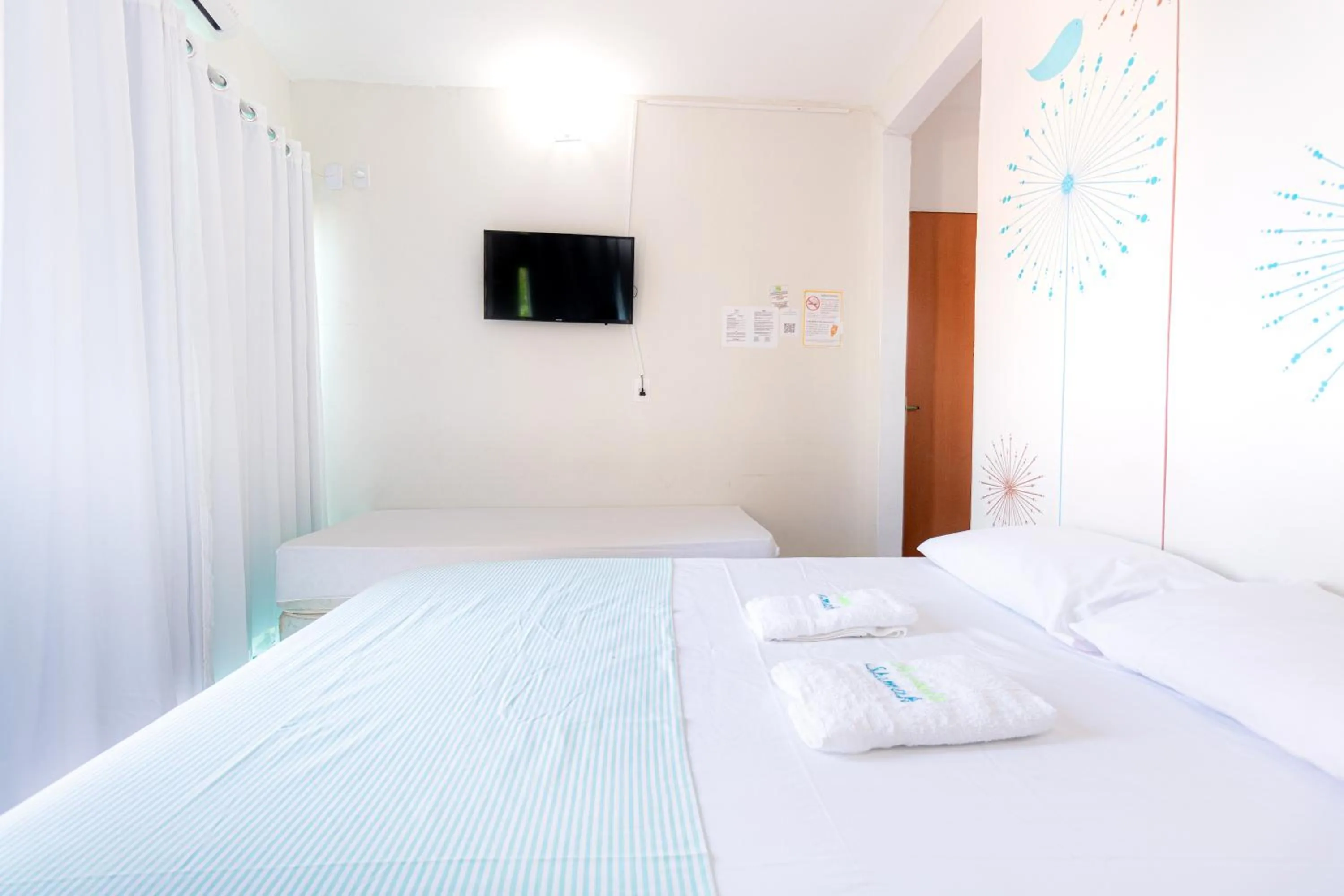 Bed in Pousada Shamah