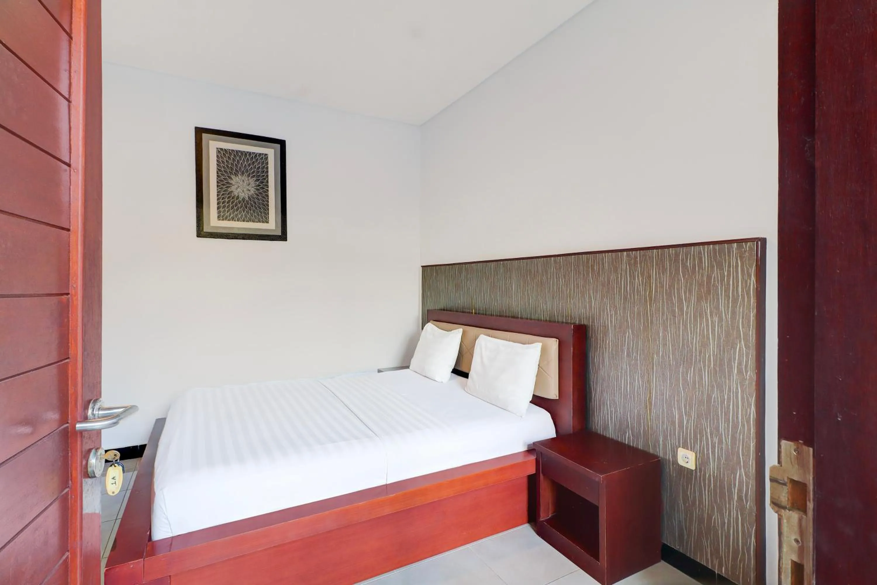 Photo of the whole room, Bed in Collection O Bali near Keonganan Beach formerly New Asta Graha Homestay