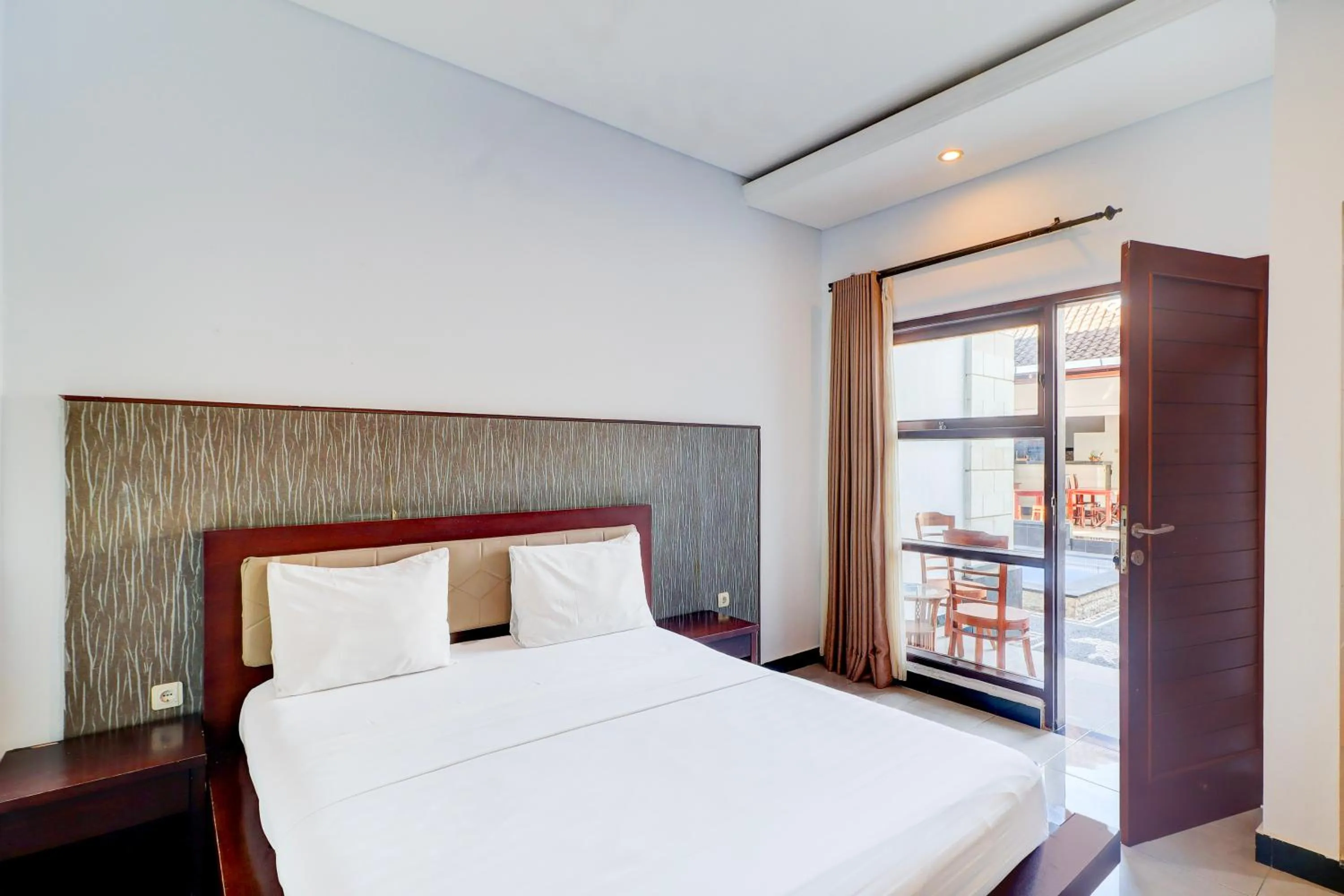 Photo of the whole room, Bed in Collection O Bali near Keonganan Beach formerly New Asta Graha Homestay