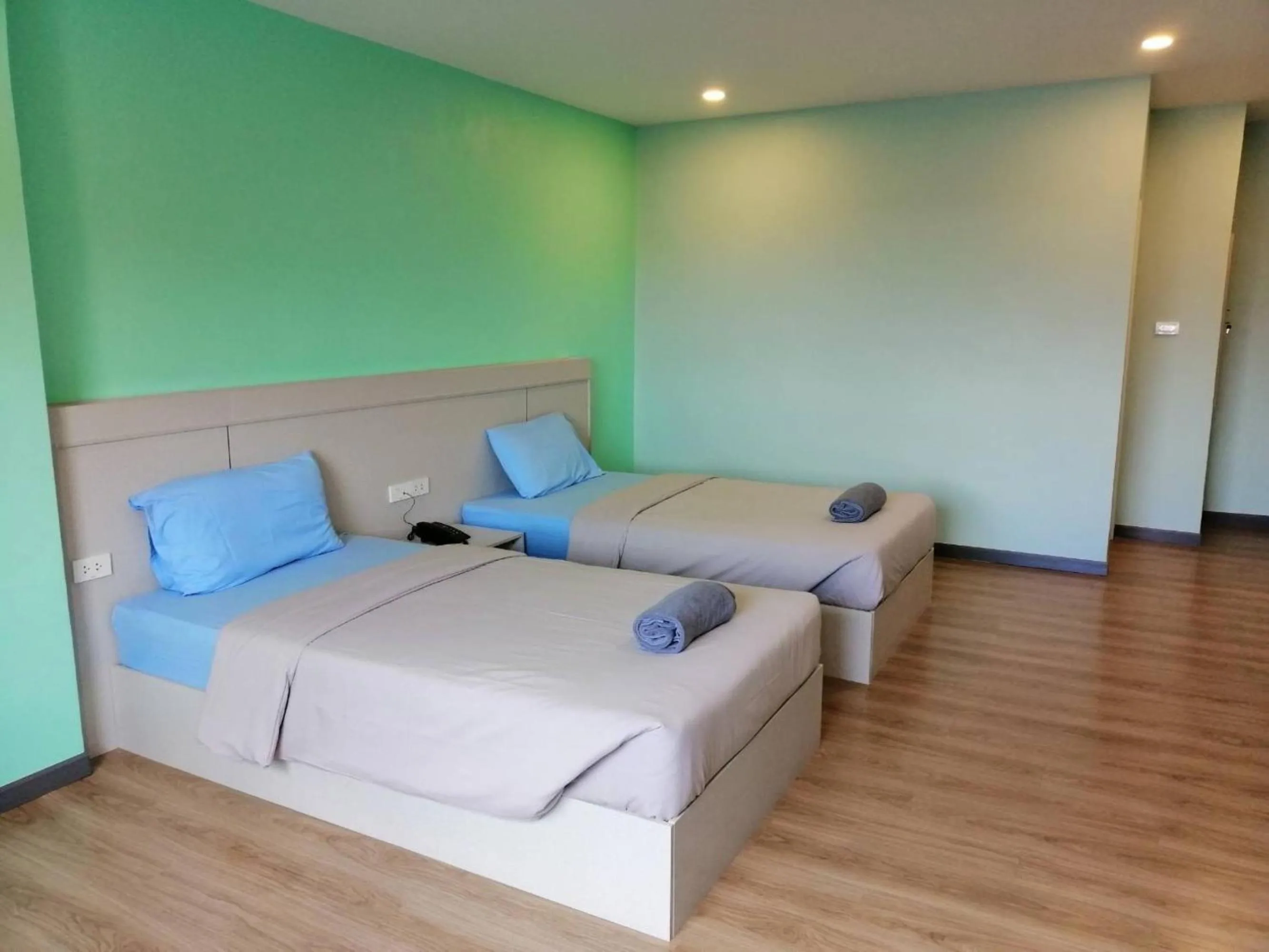 Bed in Sritrang Residence