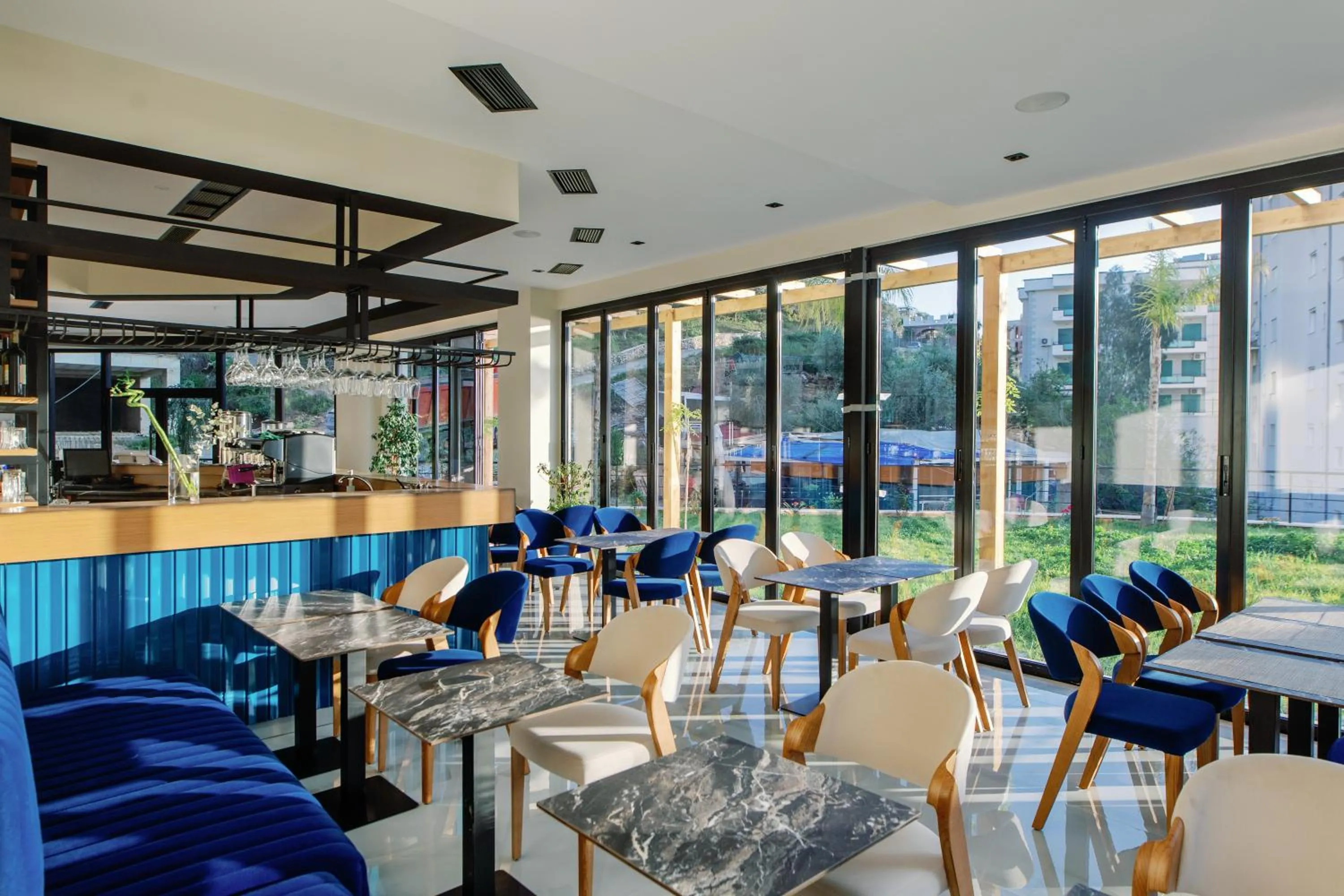 Communal lounge/ TV room in Valza Boutique Hotel