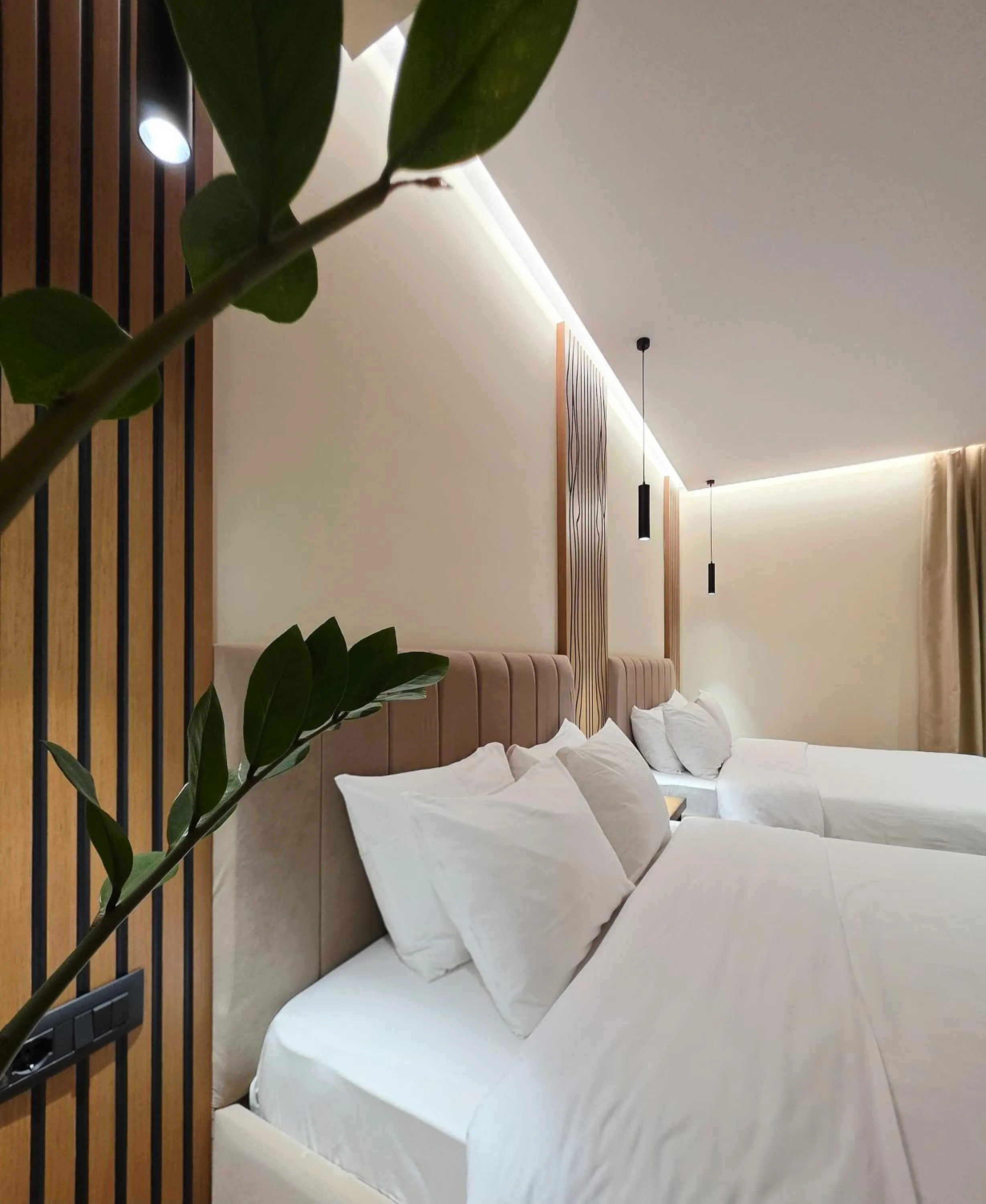 Bed in Valza Boutique Hotel