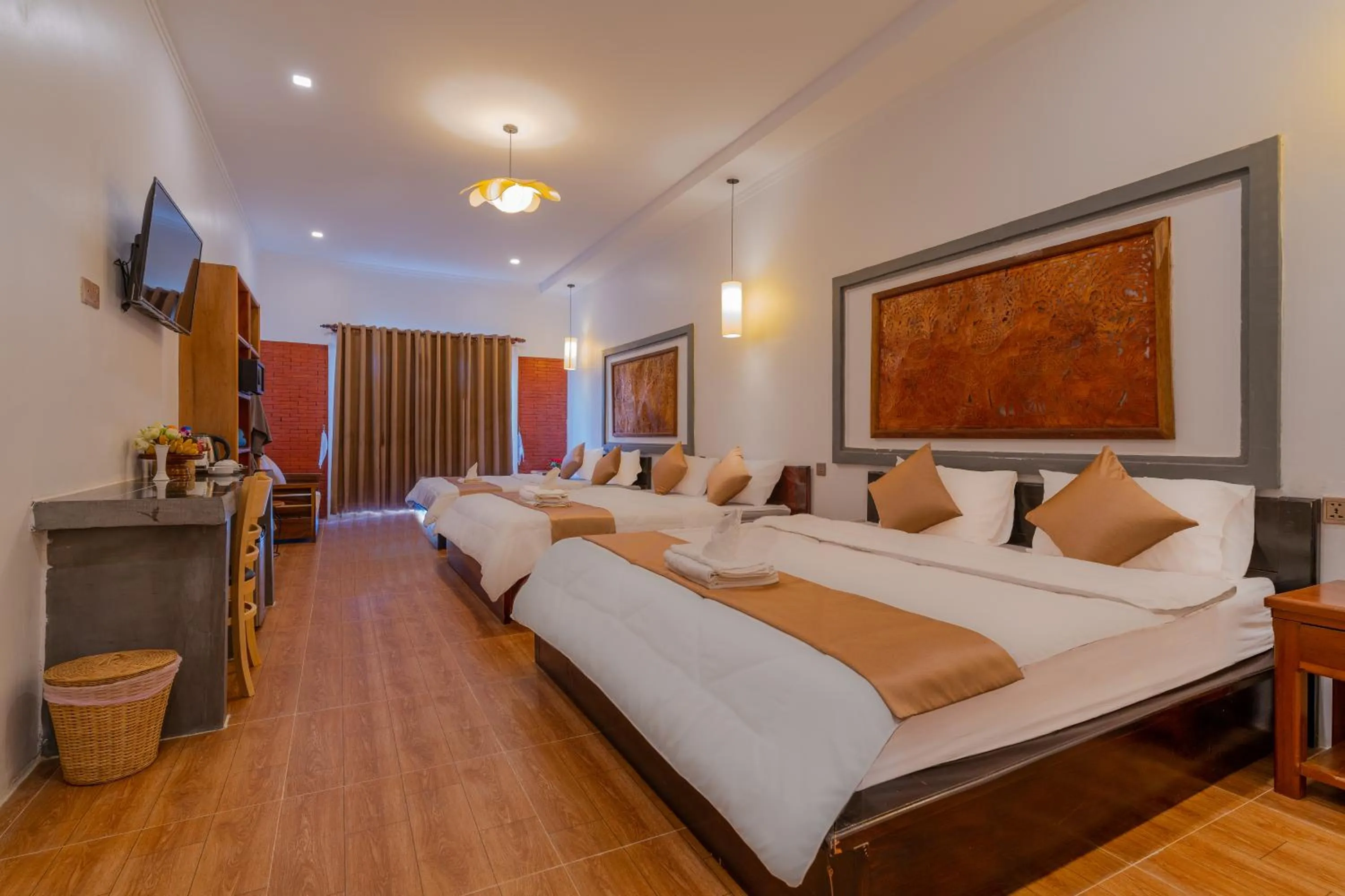 Photo of the whole room, Bed in Angkor Rithy Boutiquese
