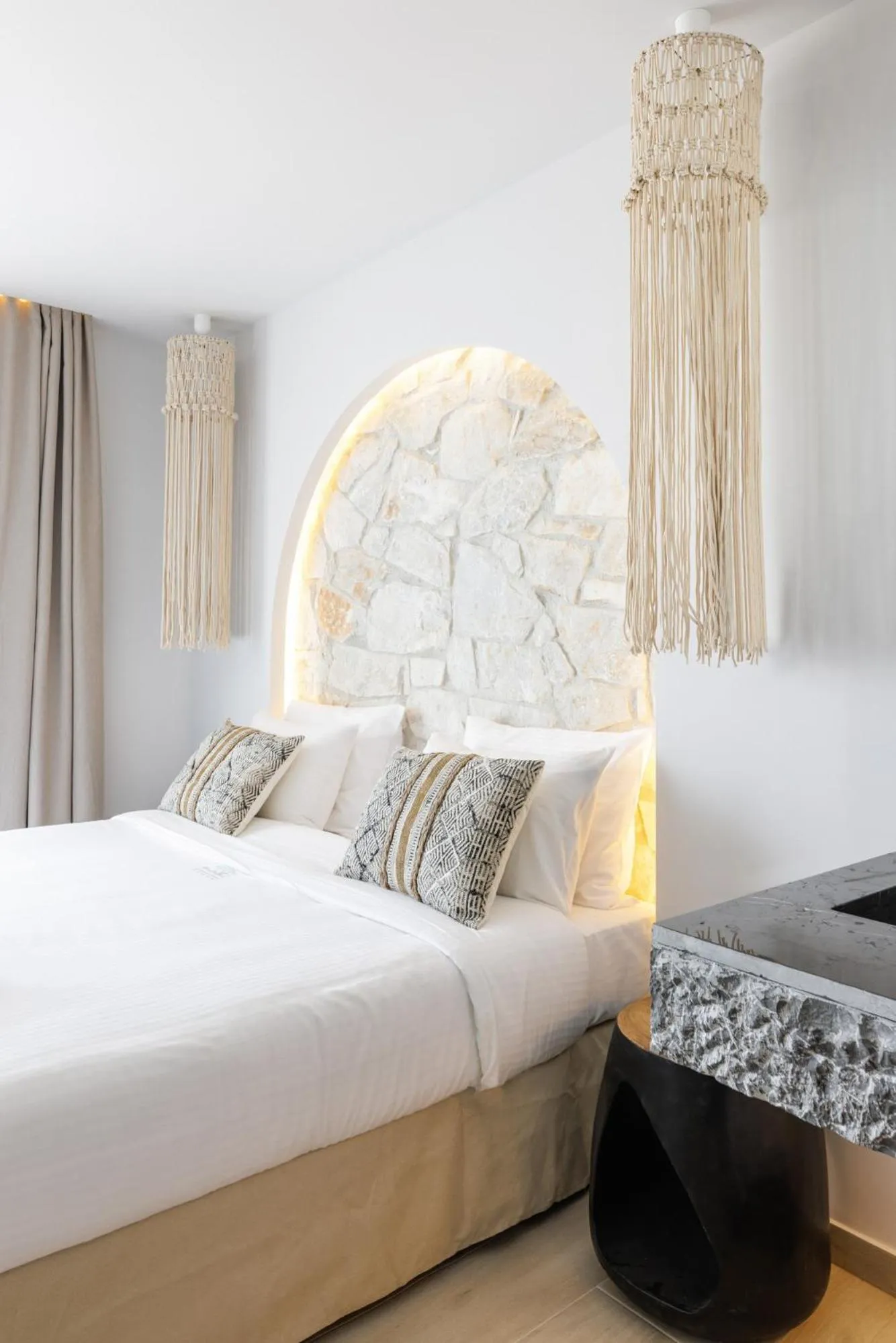 Bed in Amalthia Luxury Suites