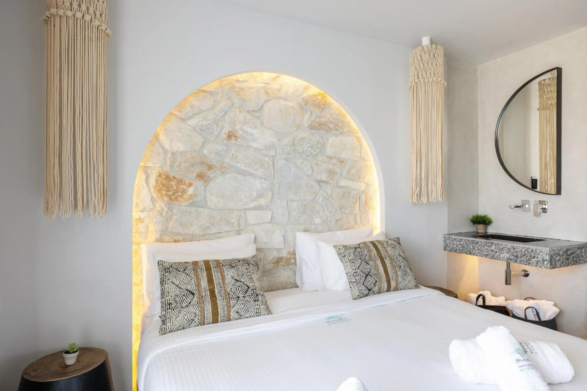 Bed in Amalthia Luxury Suites