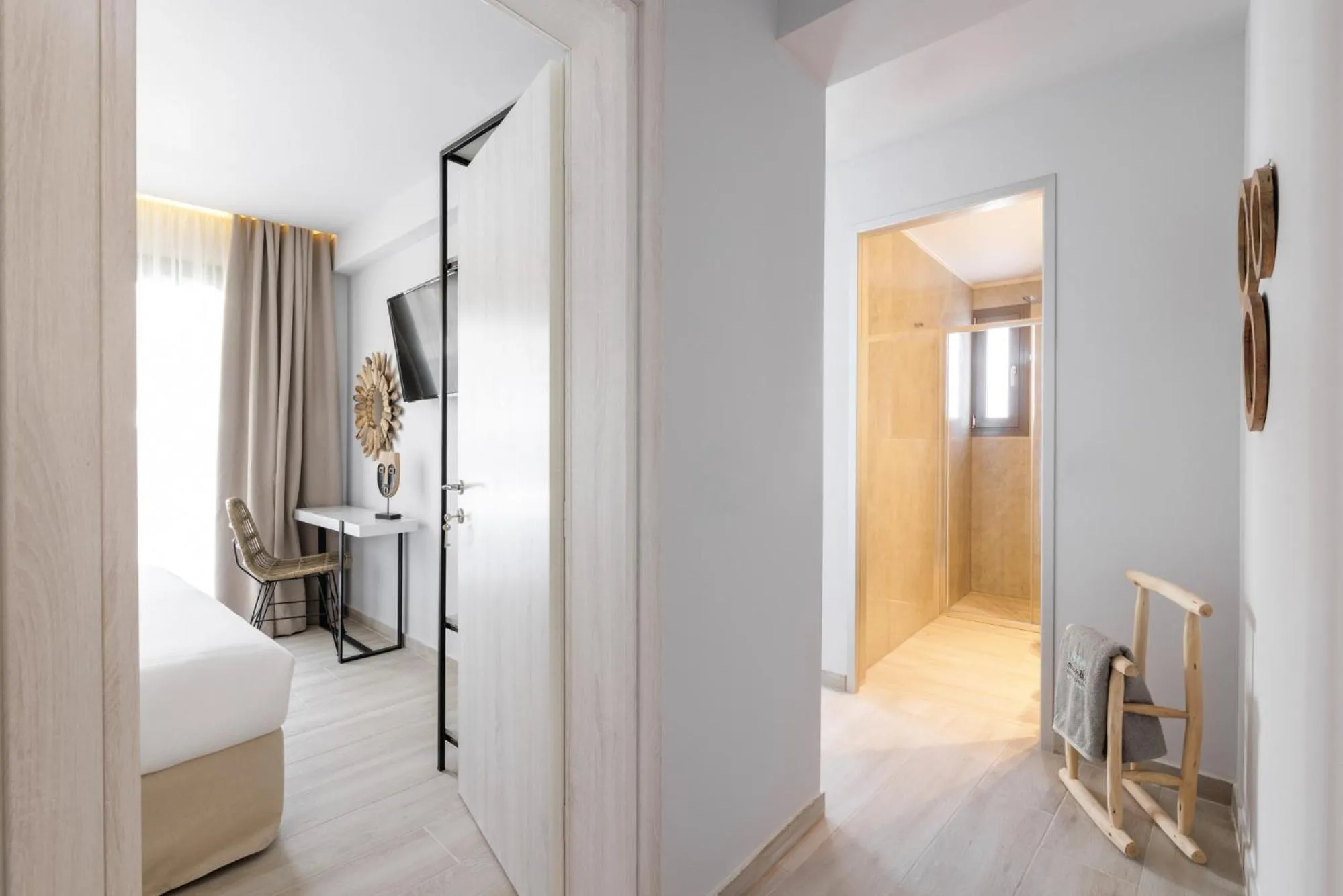 Bed in Amalthia Luxury Suites