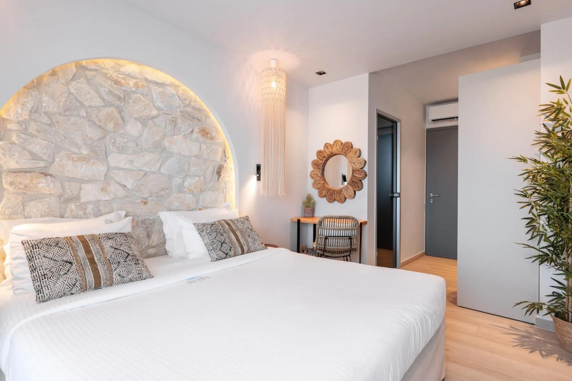 Bed in Amalthia Luxury Suites