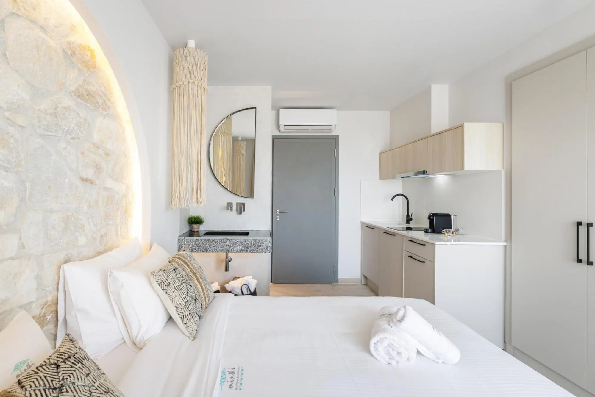 Bed in Amalthia Luxury Suites