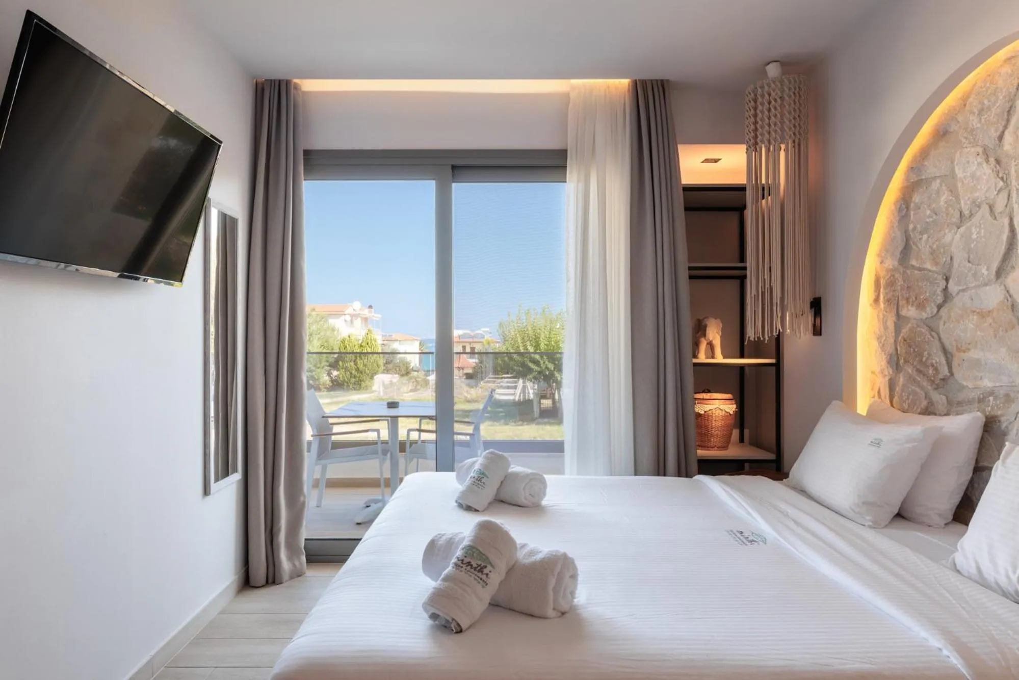 Bed in Amalthia Luxury Suites